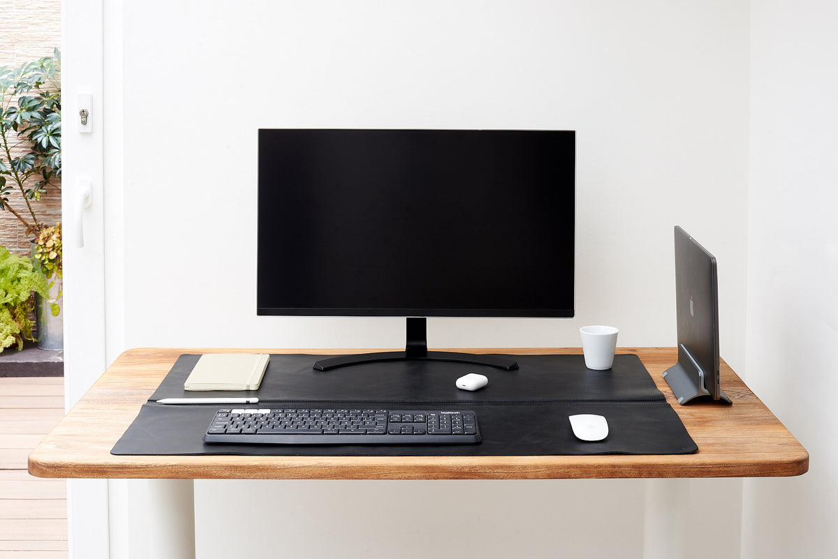 Bespoke leather desk mat, enhancing daily workflow.