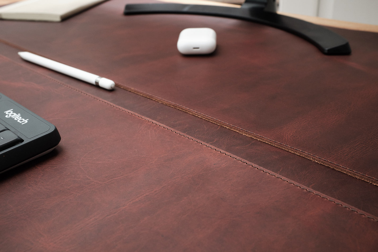 High-quality leather desk pad with a timeless design.