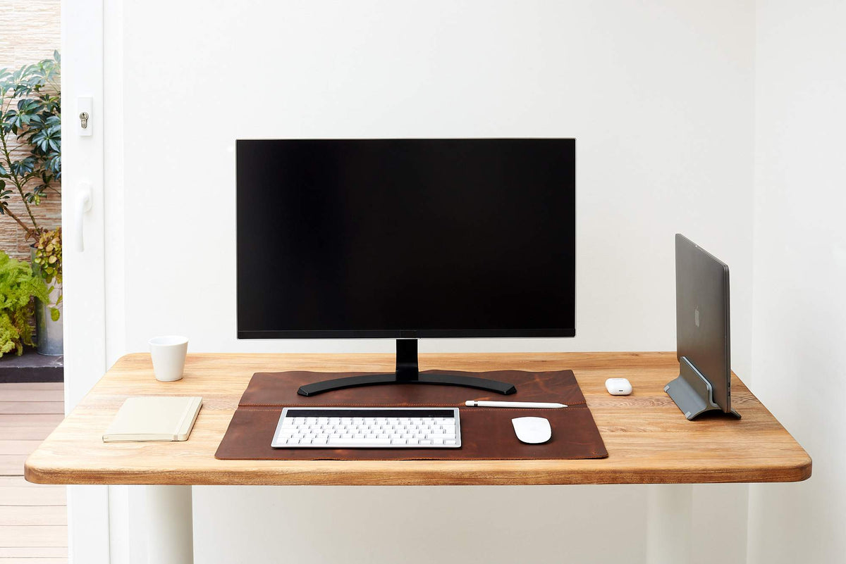 Desk pad, enhancing organization and workspace aesthetics.