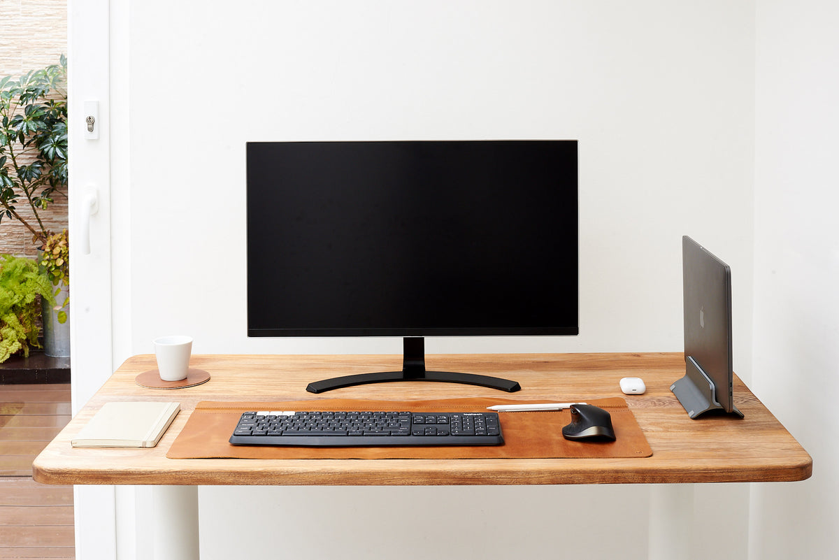 Bespoke leather desk pad for an elegant workspace.