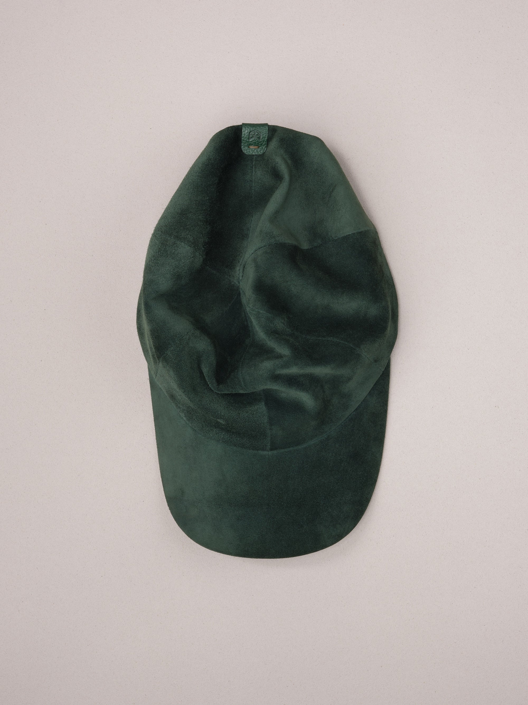 Handmade green suede baseball cap.