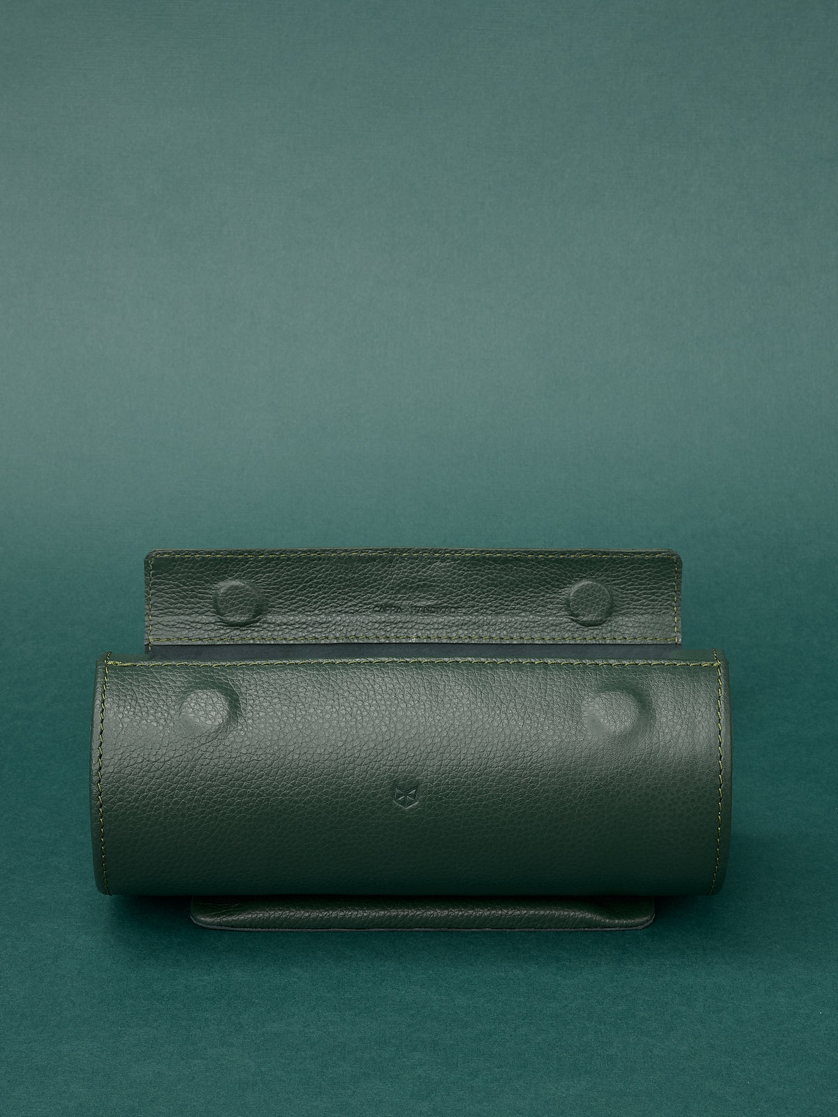 Magnetic travel case for watches. Watch collectors. Case with cylindrical shape for watch care and conservation. Made in leather by Capra Leather.