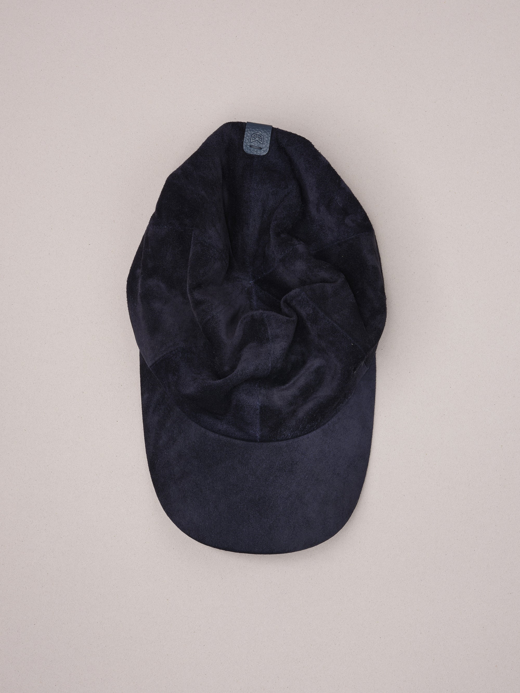 Handmade navy suede baseball cap.