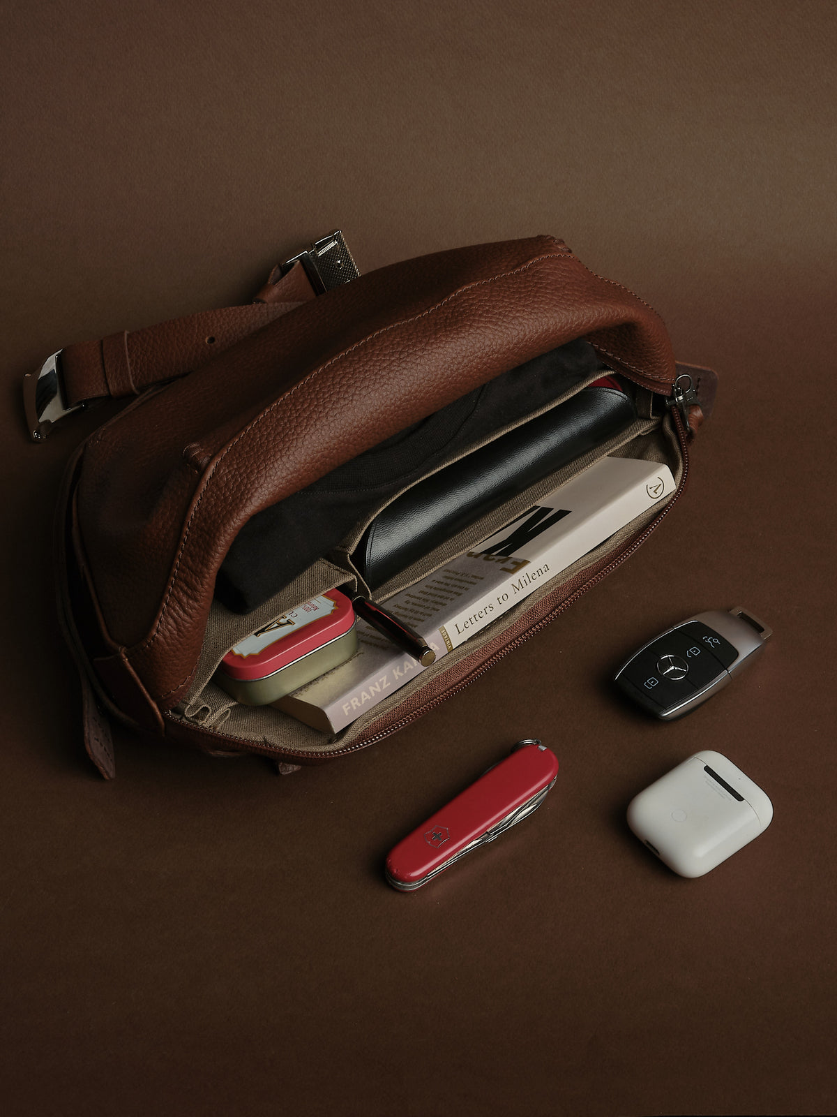 Smart Internal Dividers. Best EDC Sling Bag Brown by Capra Leather