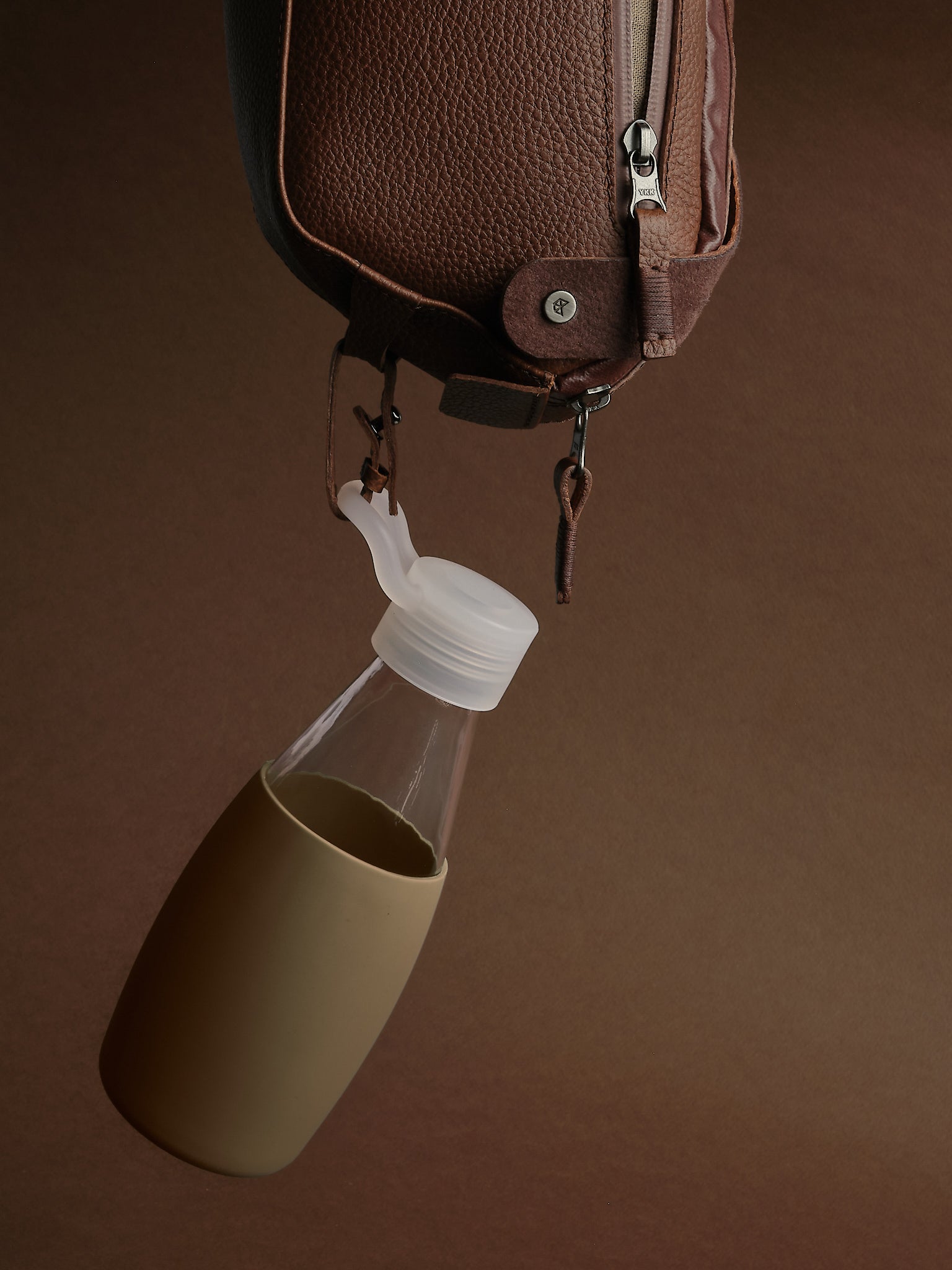 Dettachable Bottle Holder. Crossbody Sling Bag Brown by Capra Leather