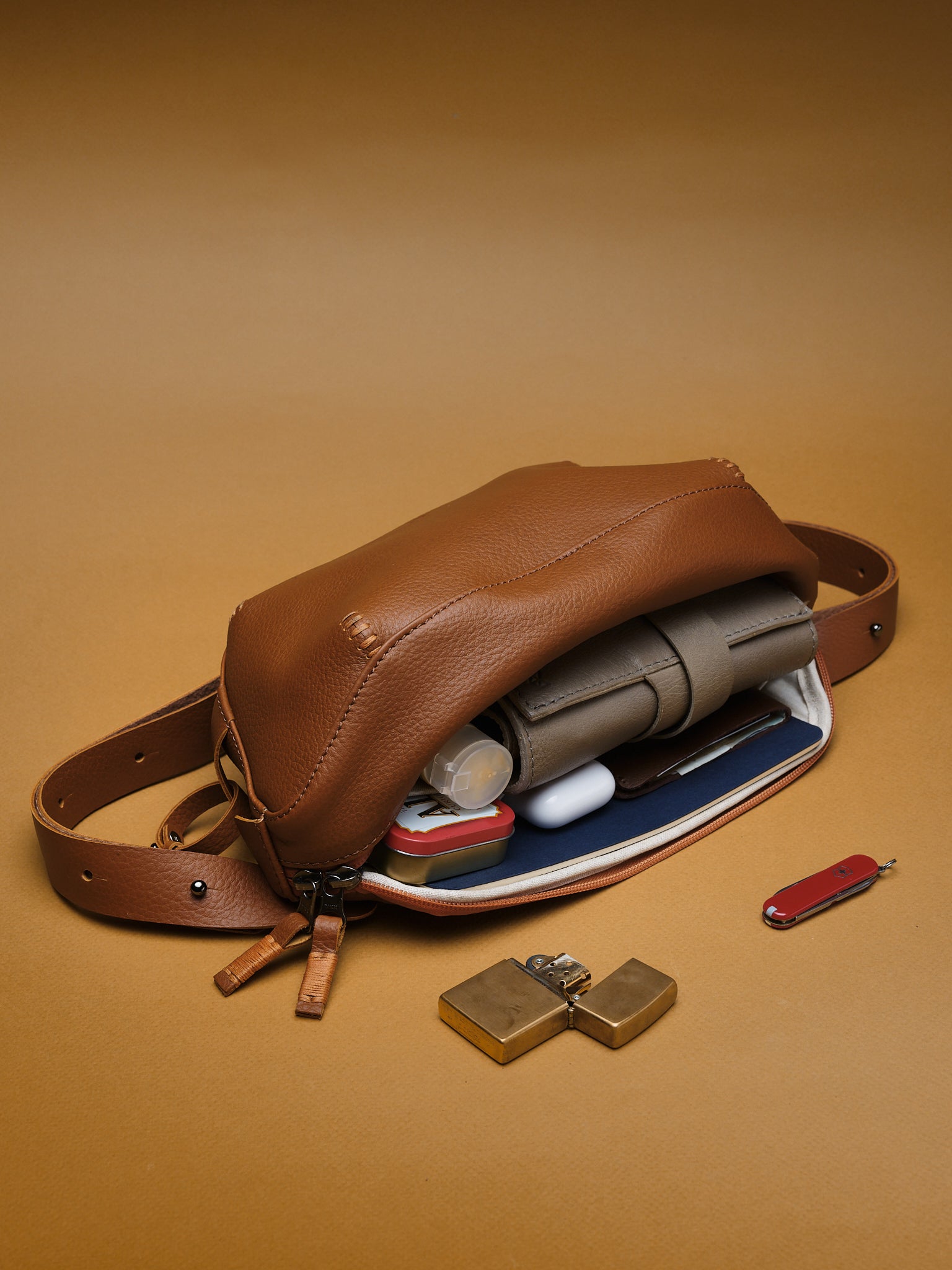 Divider pockets for small essentials. Fanny Pack Crossbody. Mens Sling Bag Tan by Capra Leather