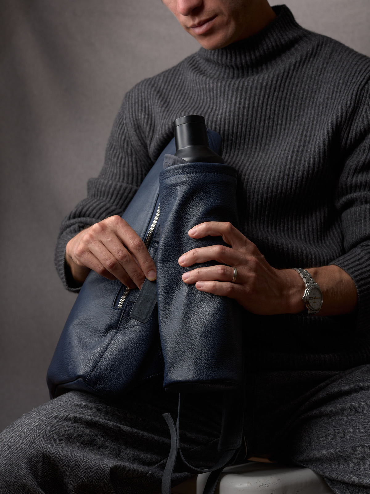 Men's style. Men's fashion. Leather and suede accessories for men. Tech backpack. Water bottle/umbrella detachable pouch. Backpack for everyday work. Leather and suede for comfort and durability. Made by Capra Leather.