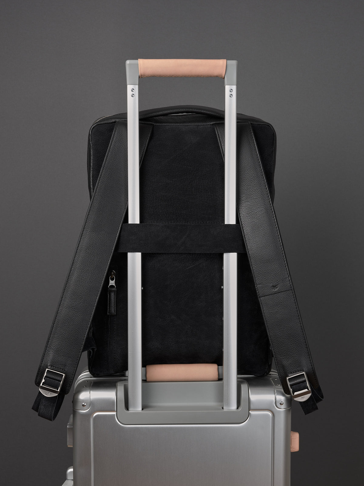 Suede and leather backpack made for men. Soft finish in leather. Invisible luggage strap for easy travel on plane. Comfortable and soft feeling. Premium materials. Made in leather by Capra Leather.