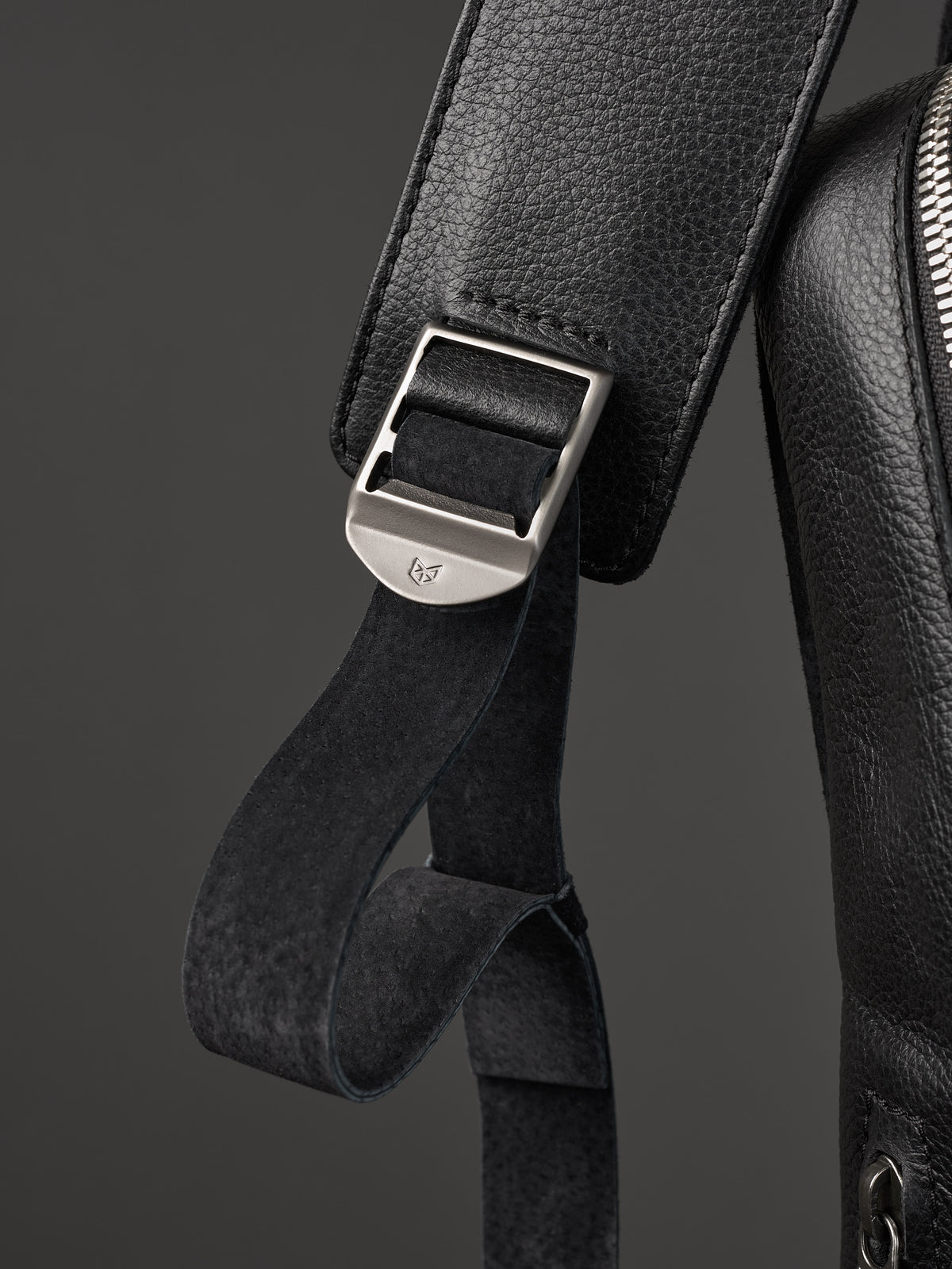 Hidden pocket in the back for easy access. Soft finish made in suede and leather. Premium materials. Double D Ring system for quick adjustments. Men's backpack for style and durability. Made in quality materials by Capra Leather.