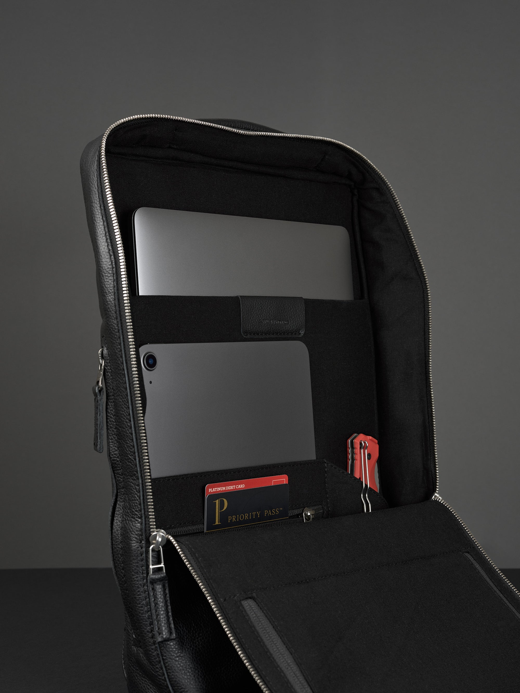 black textured leather backpack Saola Tech Backpack · Black by Capra Leather