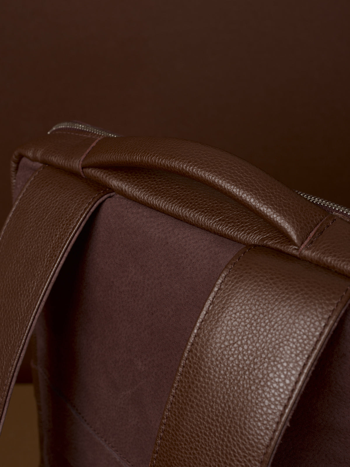Suede and leather backpack made for men. Soft finish in leather. Comfortable top handle with soft feeling. Leather accessories for men. Premium materials. Made in leather by Capra Leather.