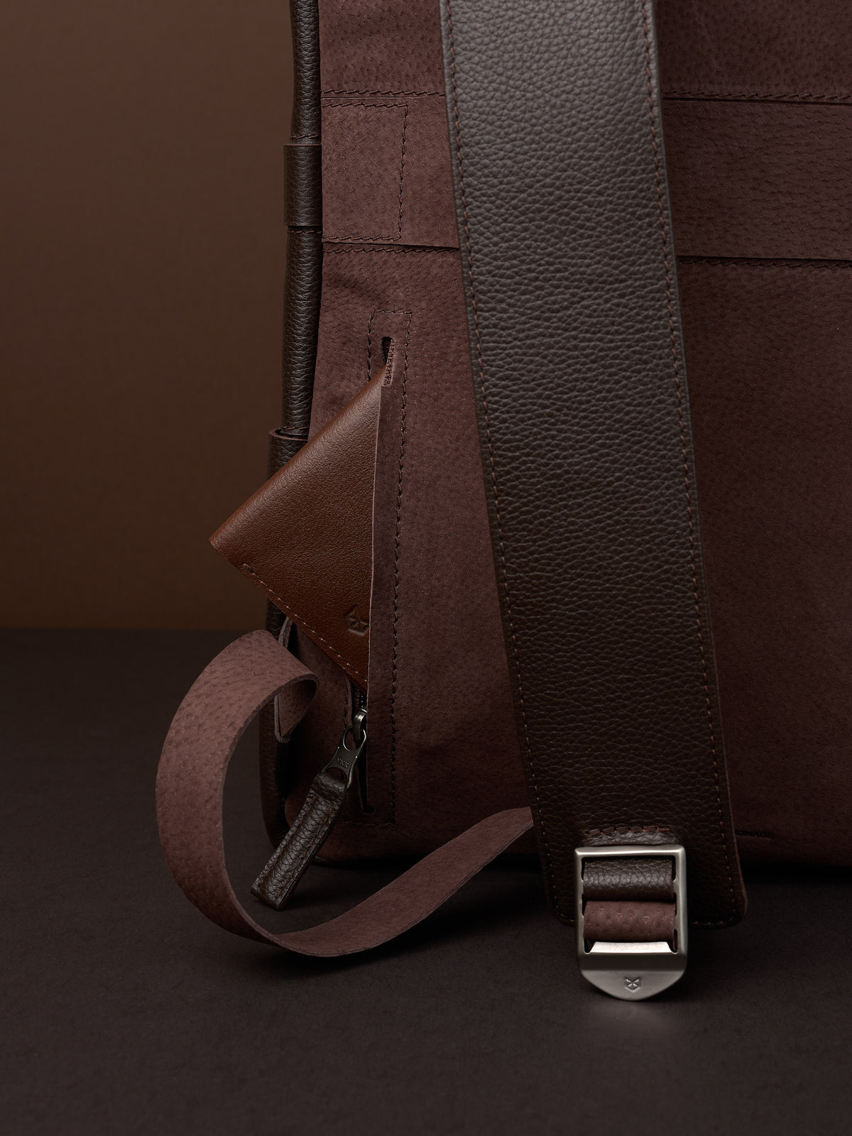 Hidden pocket in the back for easy access. Soft finish made in suede and leather. Premium materials. Double D Ring system for quick adjustments. Men's backpack for style and durability. Made in quality materials by Capra Leather.