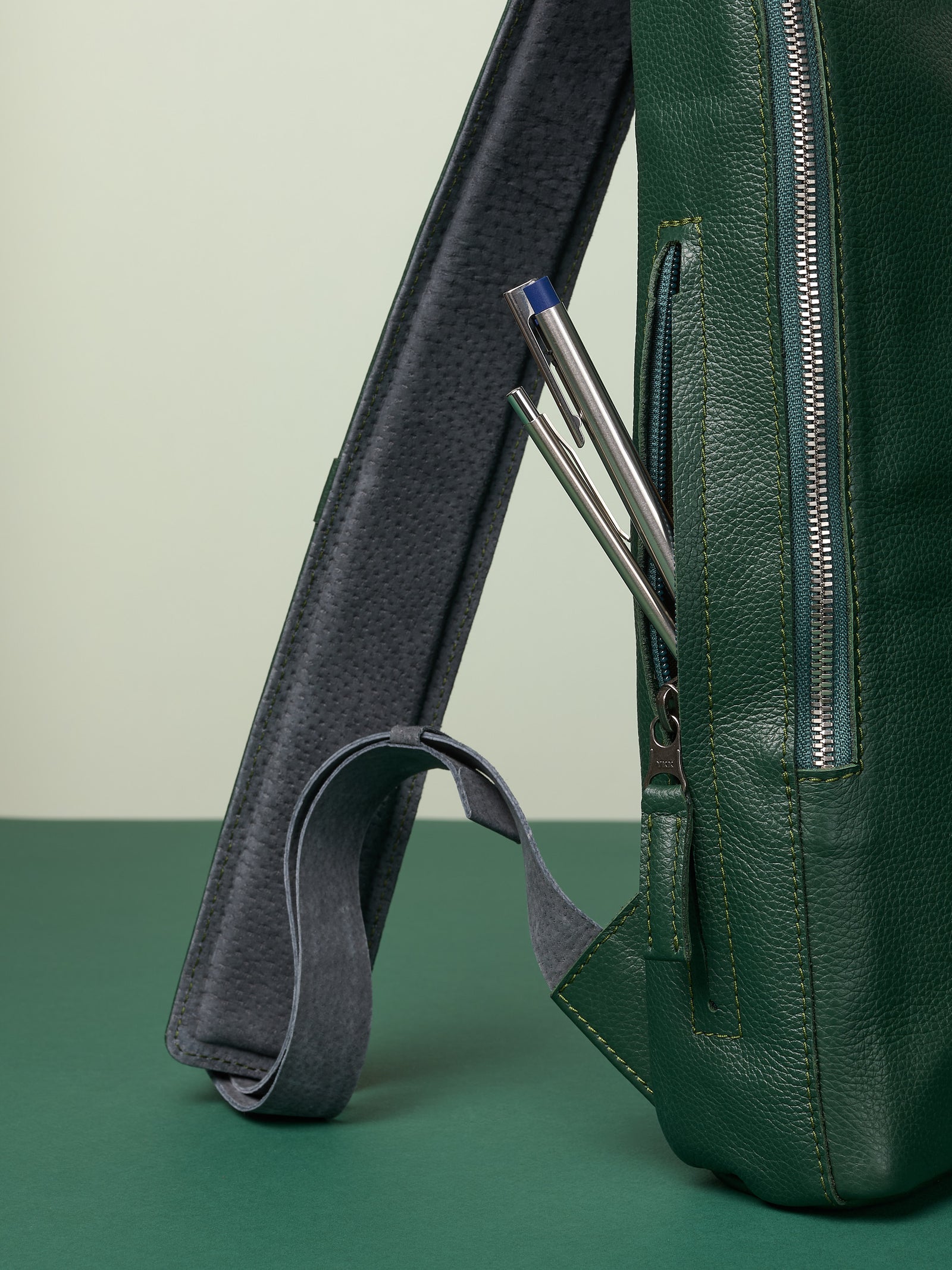 Professional backpack for men. Men's style. Men's fashion. Premium backpack for men. Side pocket for easy access. Everyday backpack. Padded shoulder straps for comfort. Memory foam padded strap for men. Quality materials for durability and style. Made in leather and suede by Capra Leather.