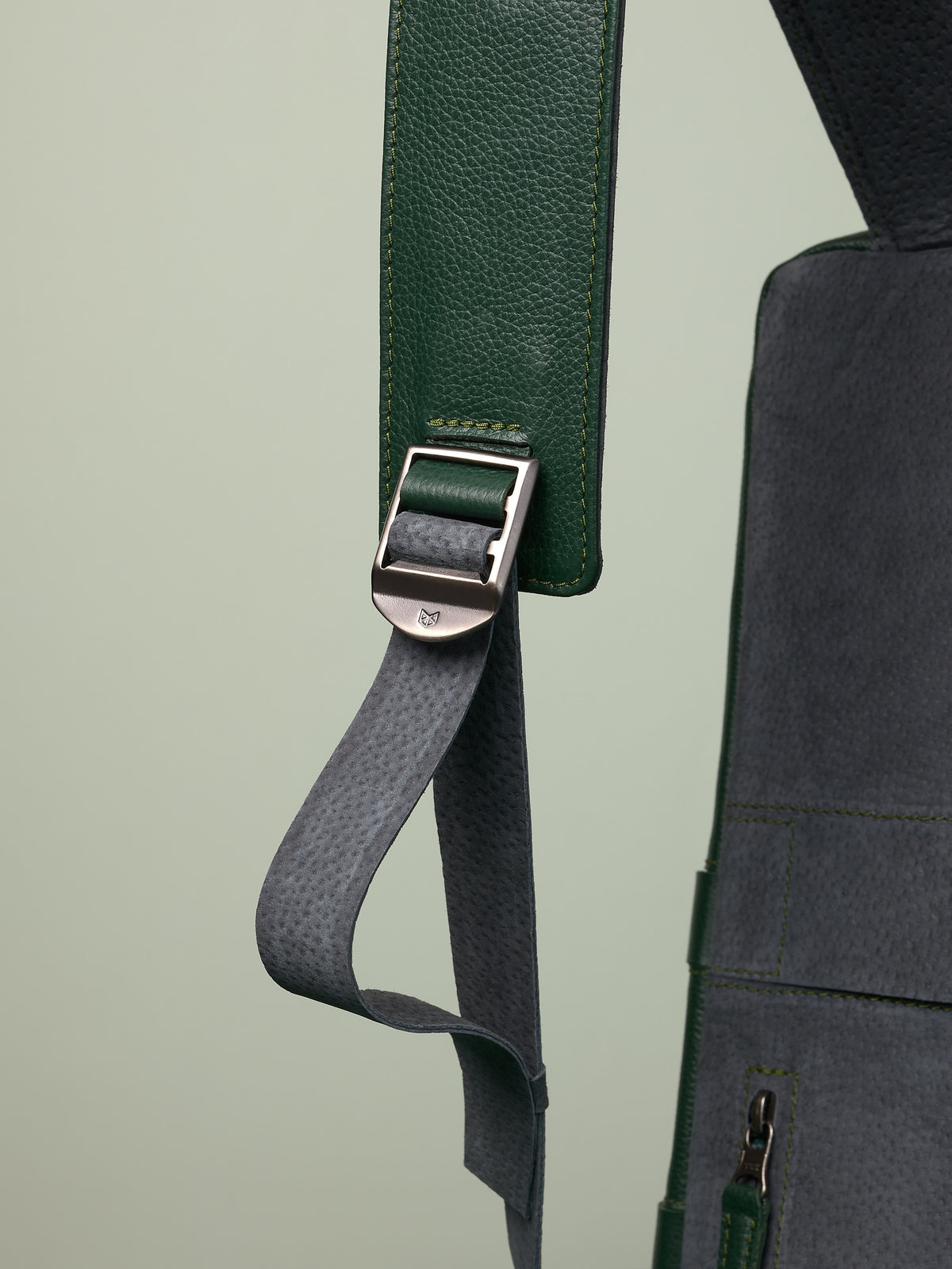 Hidden pocket in the back for easy access. Soft finish made in suede and leather. Premium materials. Double D Ring system for quick adjustments. Men's backpack for style and durability. Made in quality materials by Capra Leather.