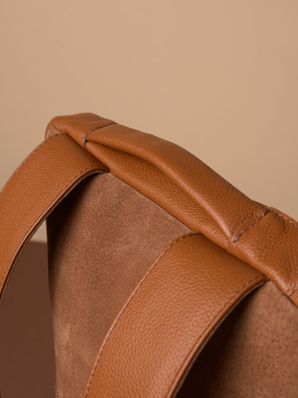 Suede and leather backpack made for men. Soft finish in leather. Comfortable top handle with soft feeling. Leather accessories for men. Premium materials. Made in leather by Capra Leather.