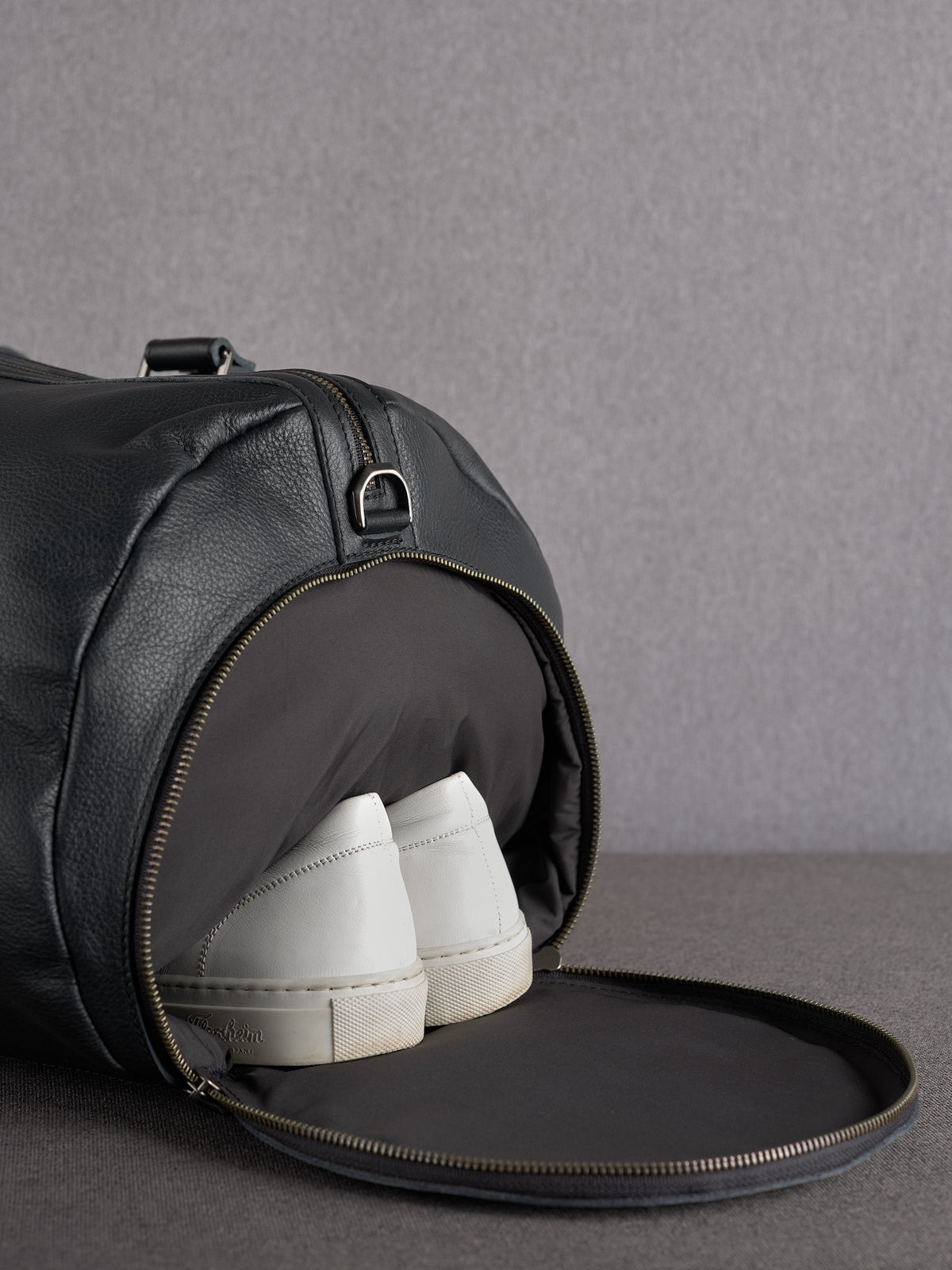 Black Weekend Bag with Shoe Compartment by Capra Leather