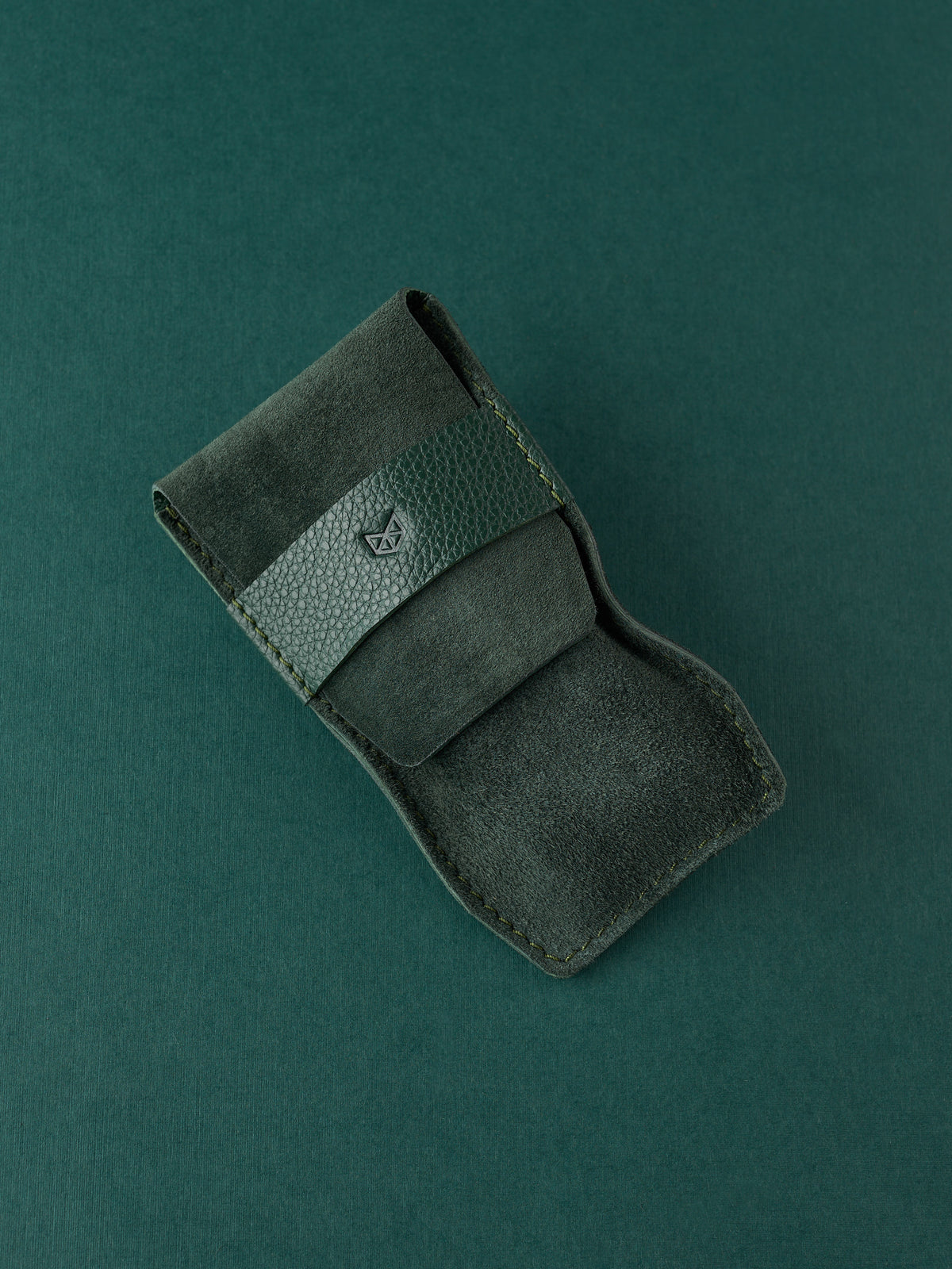 Capra Leather green suede watch pouch with a distinctive leather strap made for men.
