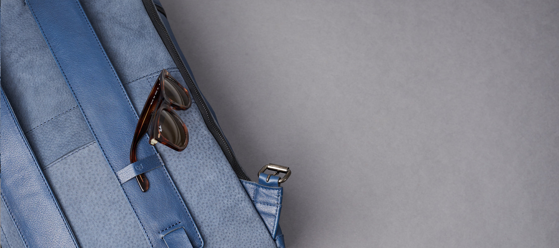 Eyewear holder. Banteng Travel Laptop Backpack by Capra Leather