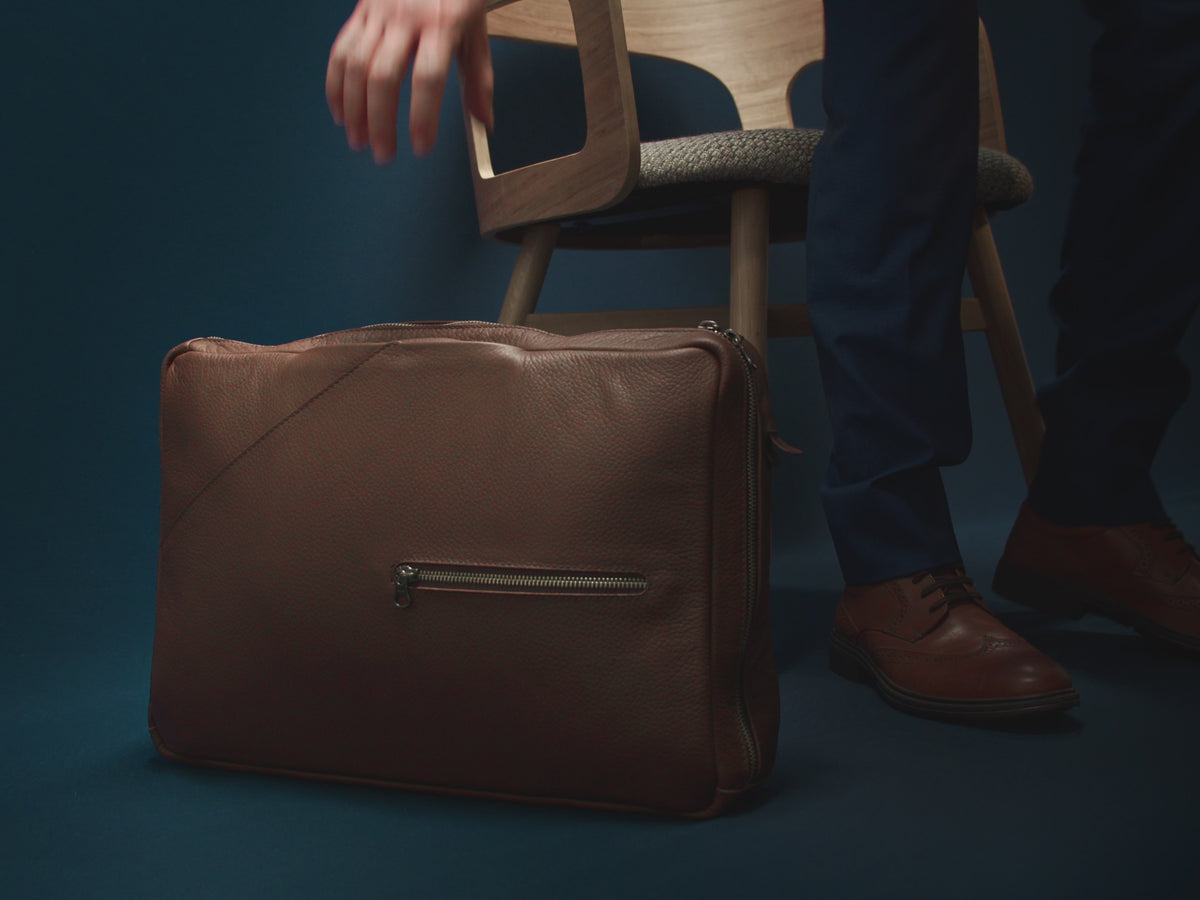 The Capra Leather Hybrid Briefcase Backpack, a convertible leather backpack and briefcase