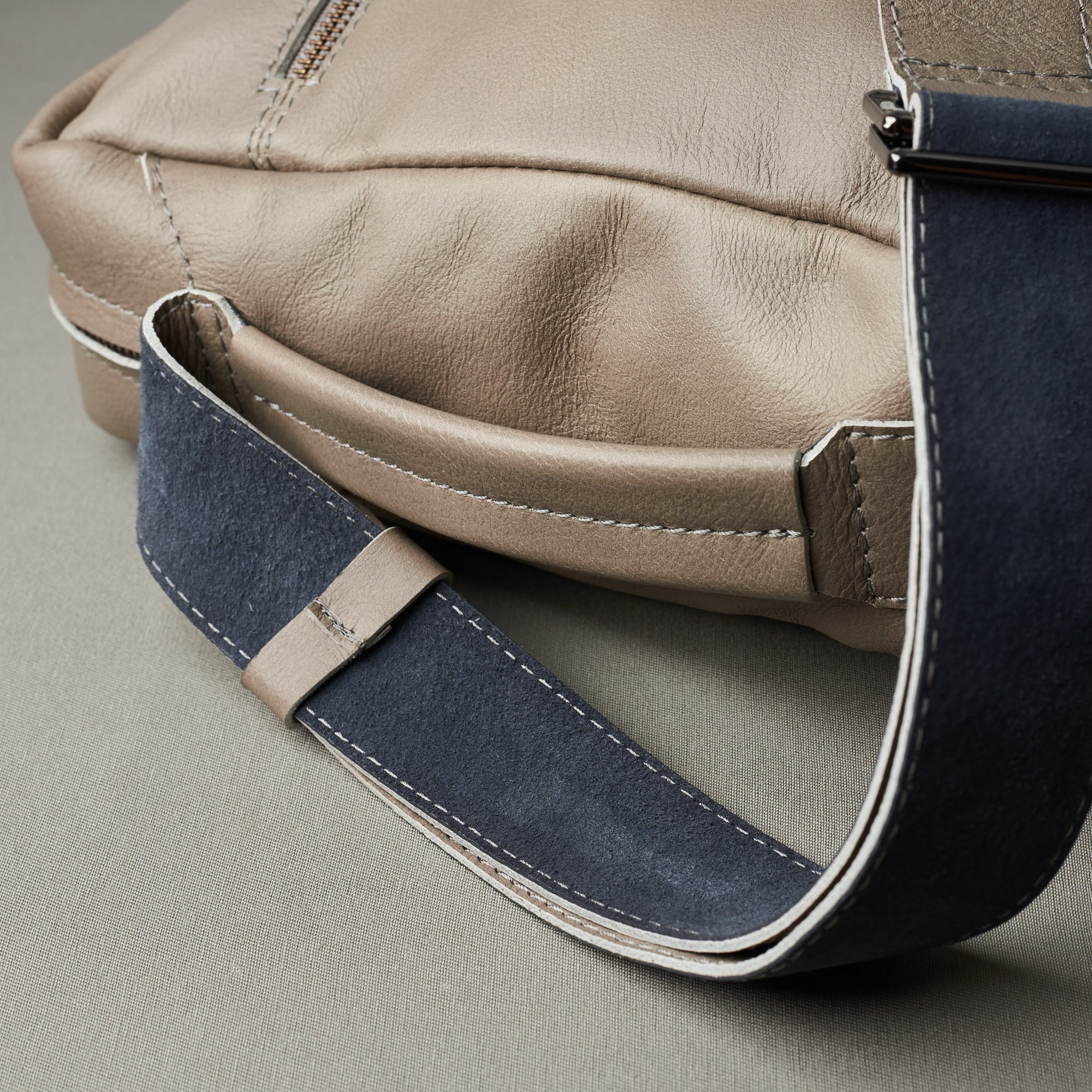 Strap detail. Grey handmade leather messenger bag for Men by Capra Leather. Macbook Pro 13 inch 15 inch leather bag. Unique mens bag 