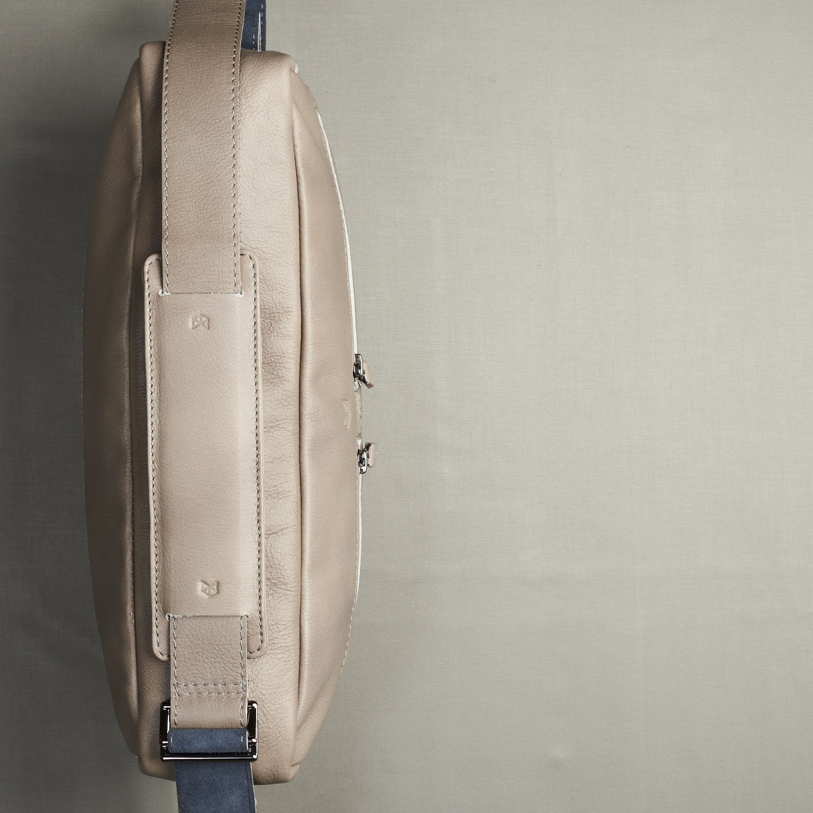 Aerial view. Grey handmade leather messenger bag for Men by Capra Leather. Macbook Pro 13 inch 15 inch leather bag. Unique mens bag 