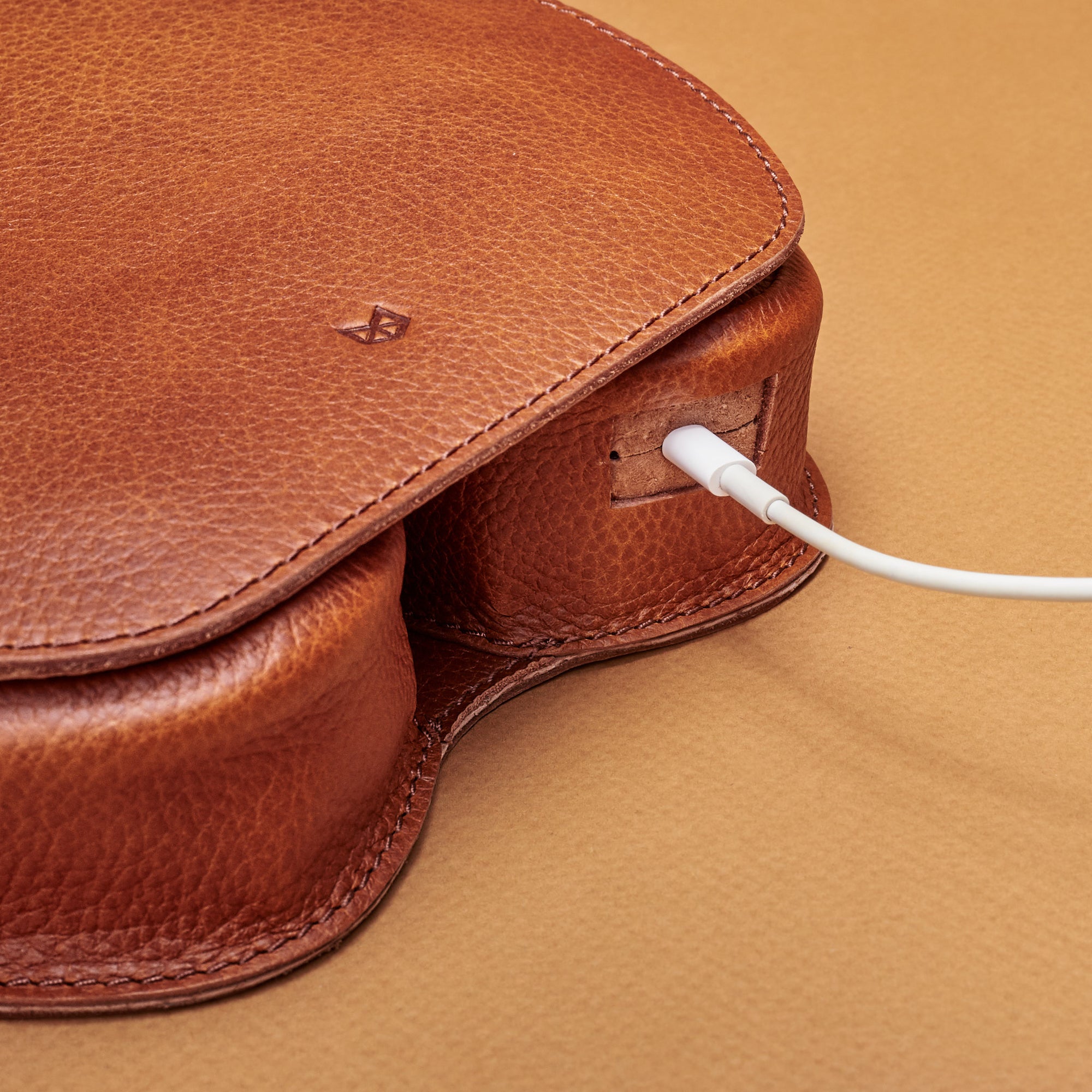 Cable Hole for In-Case Charging. AirPods Max Case Shield Tan by Capra Leather