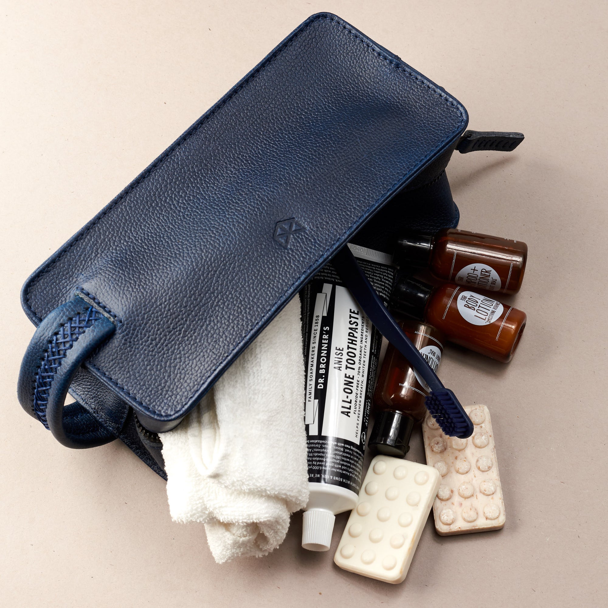 Styling 2. Ocean blue leather toiletry, shaving bag with hand stitched handle. Groomsmen gifts. Leather good crafted by Capra Leather 