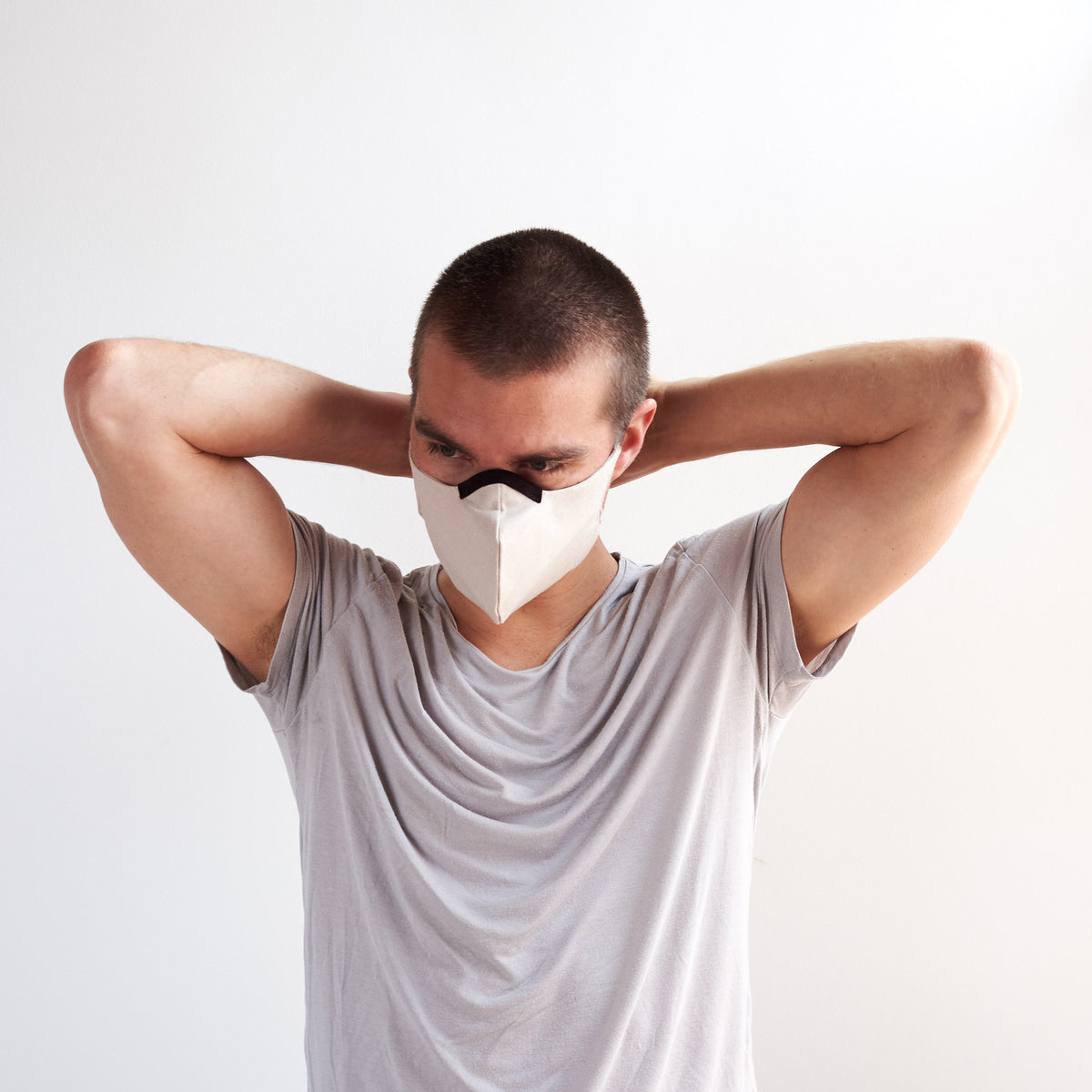 Adjusting view. Light Linen Face Mask by Capra Leather