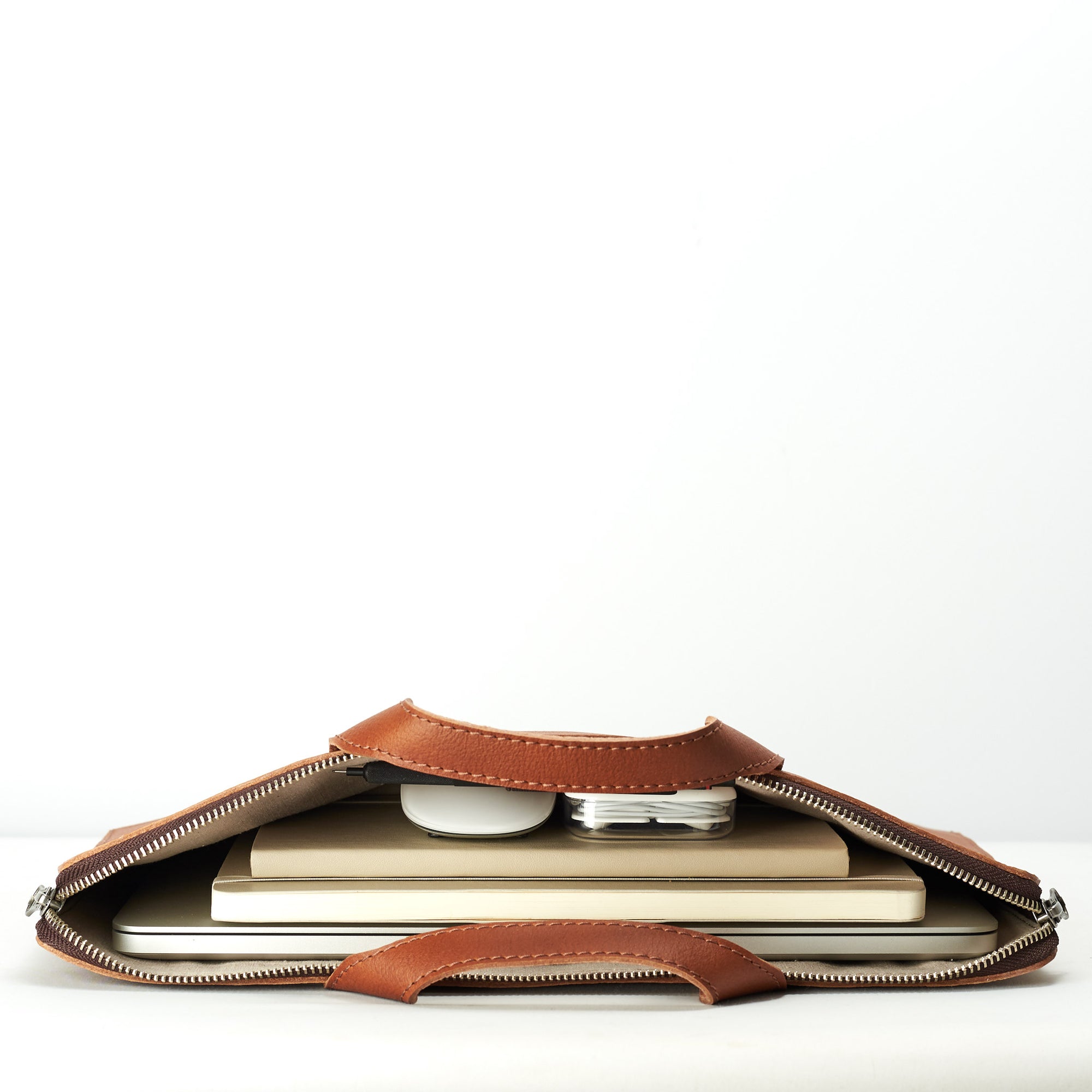 Carry electronic devices, documents and notebooks. Tan laptop portfolio. Business document organizer for men.