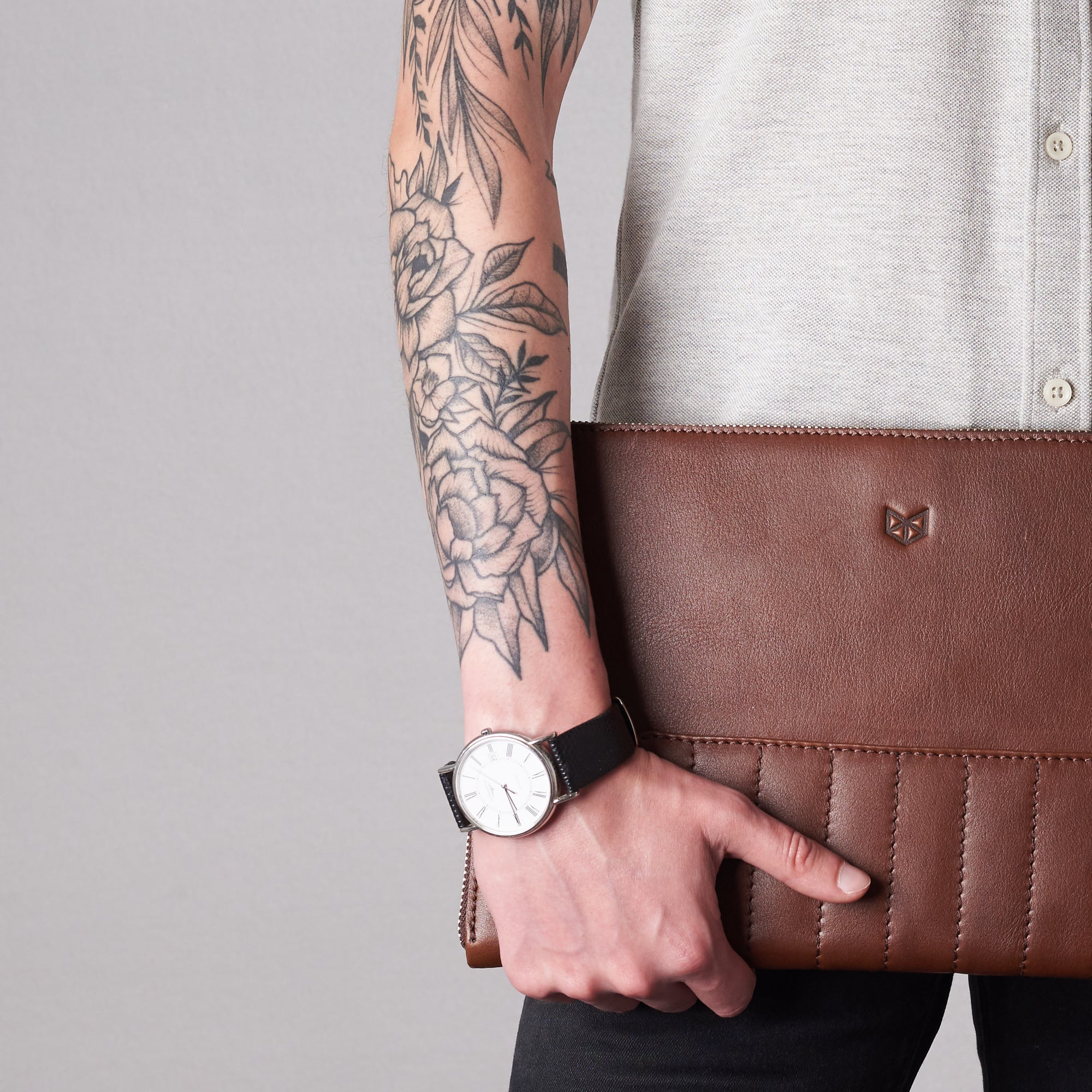 Style front detail Biker brown portfolio by Capra Leather.