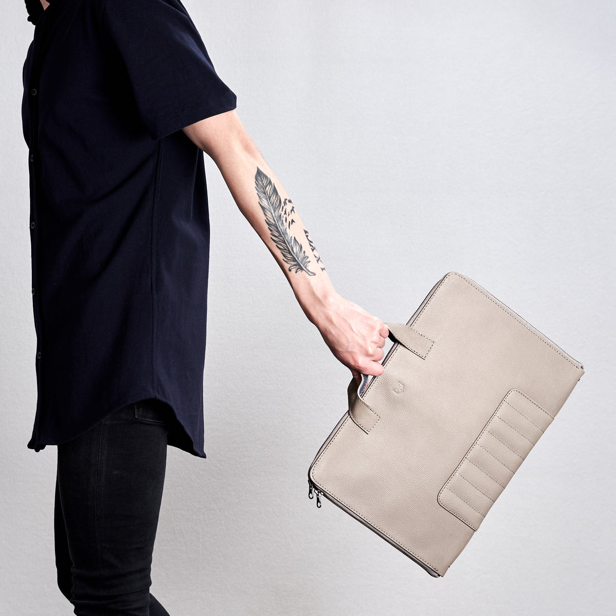 Biker grey portfolio with handles made by Capra Leather. 