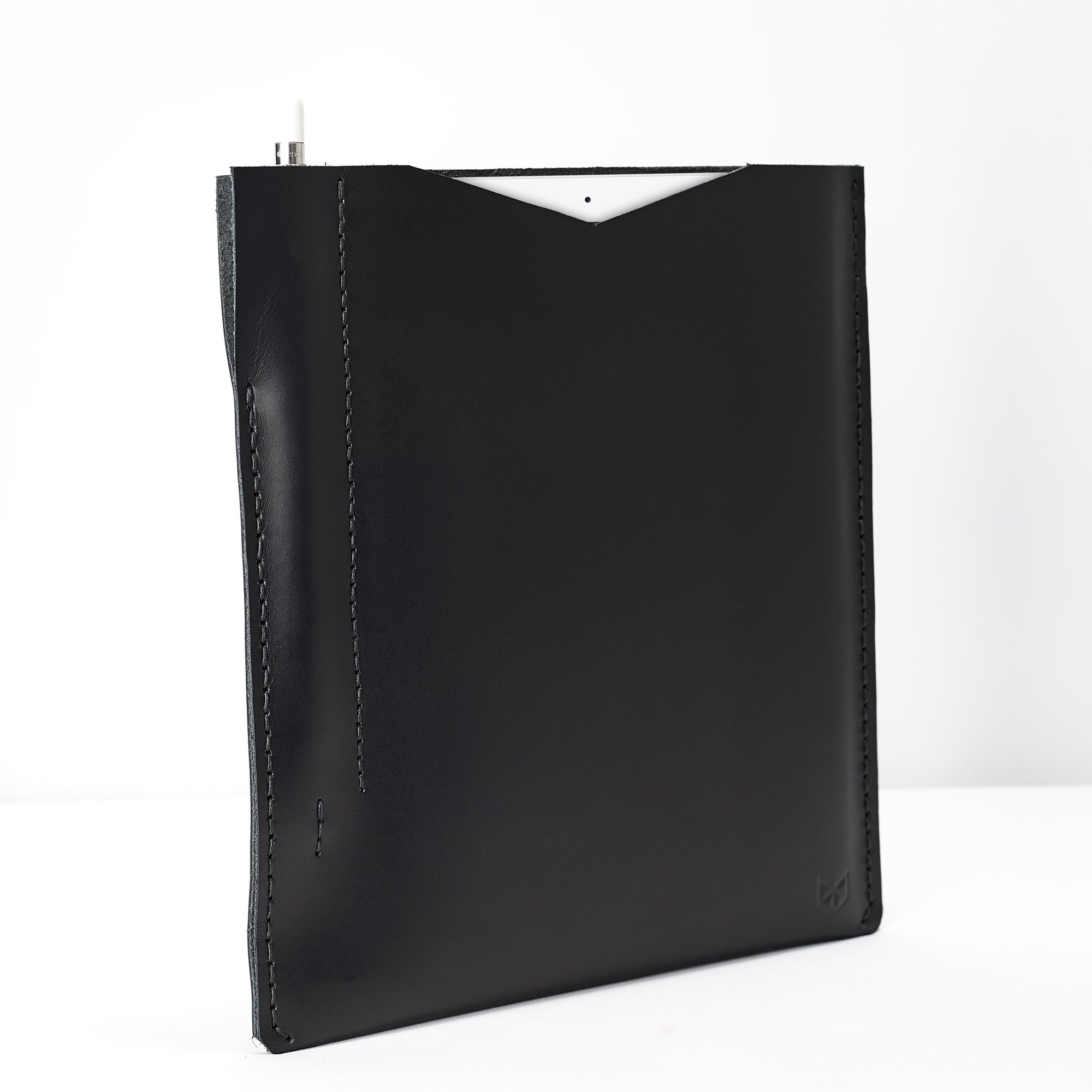 Side from the slim iPad pro sleeve. Black iPad pro leather sleeve with apple pencil holder 