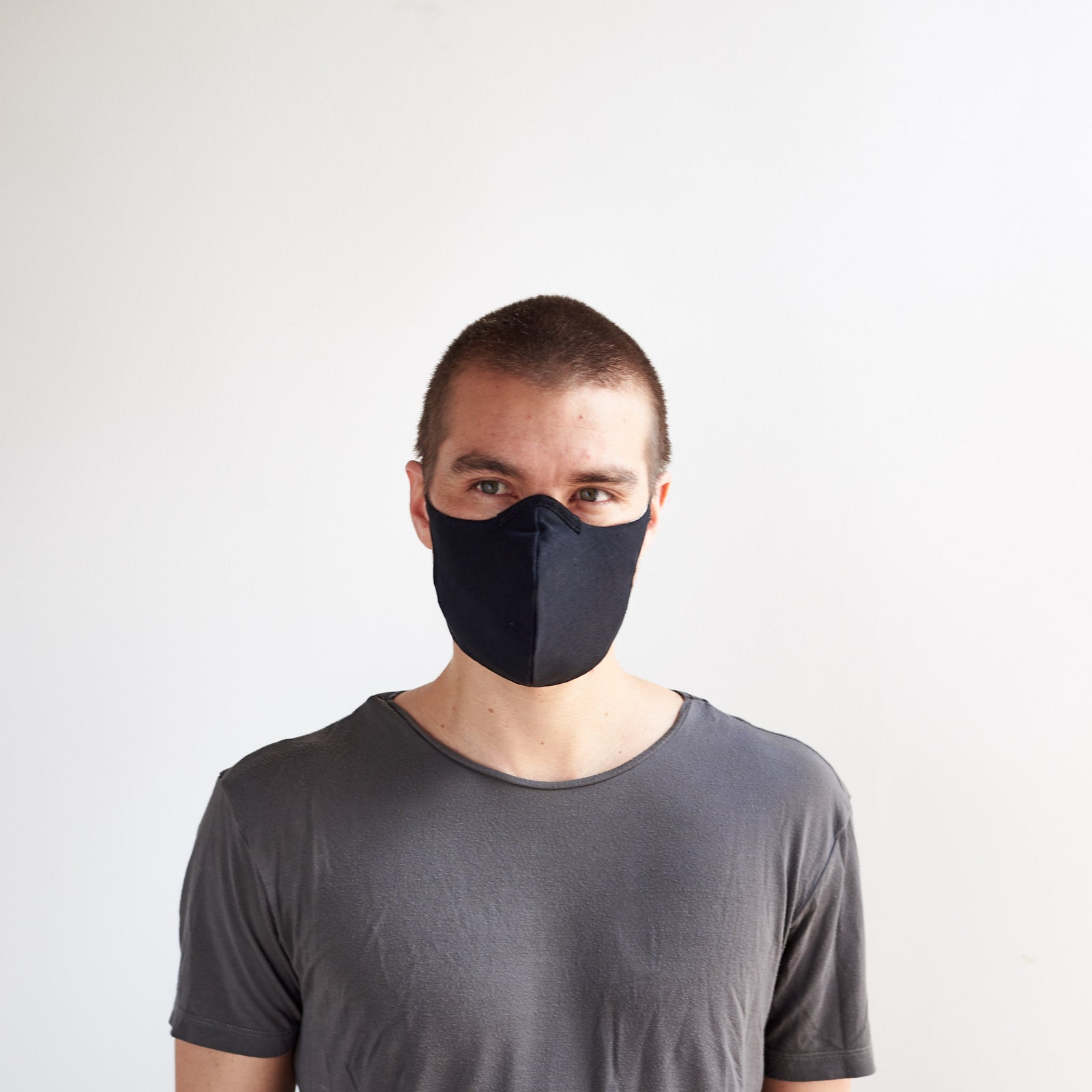 Front view. Black Linen Face Mask by Capra Leather 
