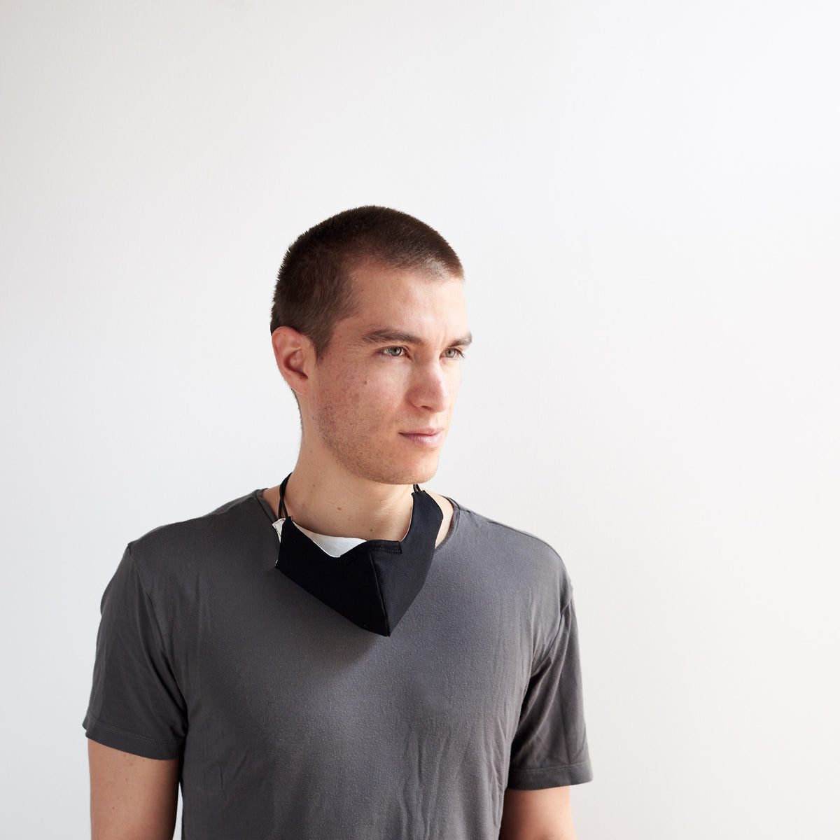 Side view. Black reusable Adult & Kid Face Mask by Capra Leather