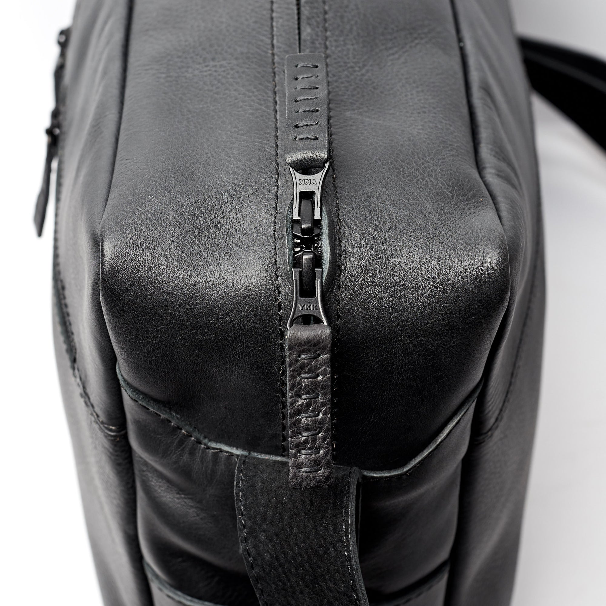 YKK metallic zippers. Back handmade leather messenger bag for men. Commuter bag, laptop leather bag by Capra Leather.