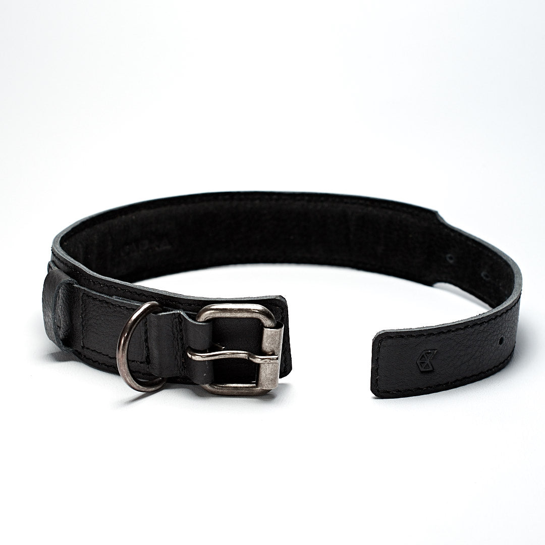 Open handmade minimal black leather padded dog collar by Capra Leather.