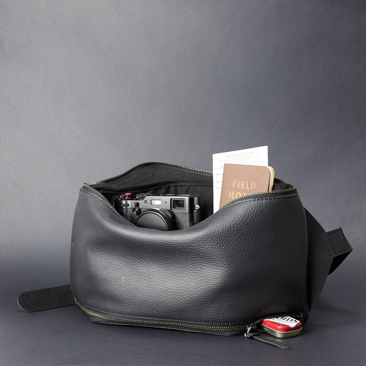 Style camera shoulder bag. Fenek Sling Bag Black by Capra Leather
