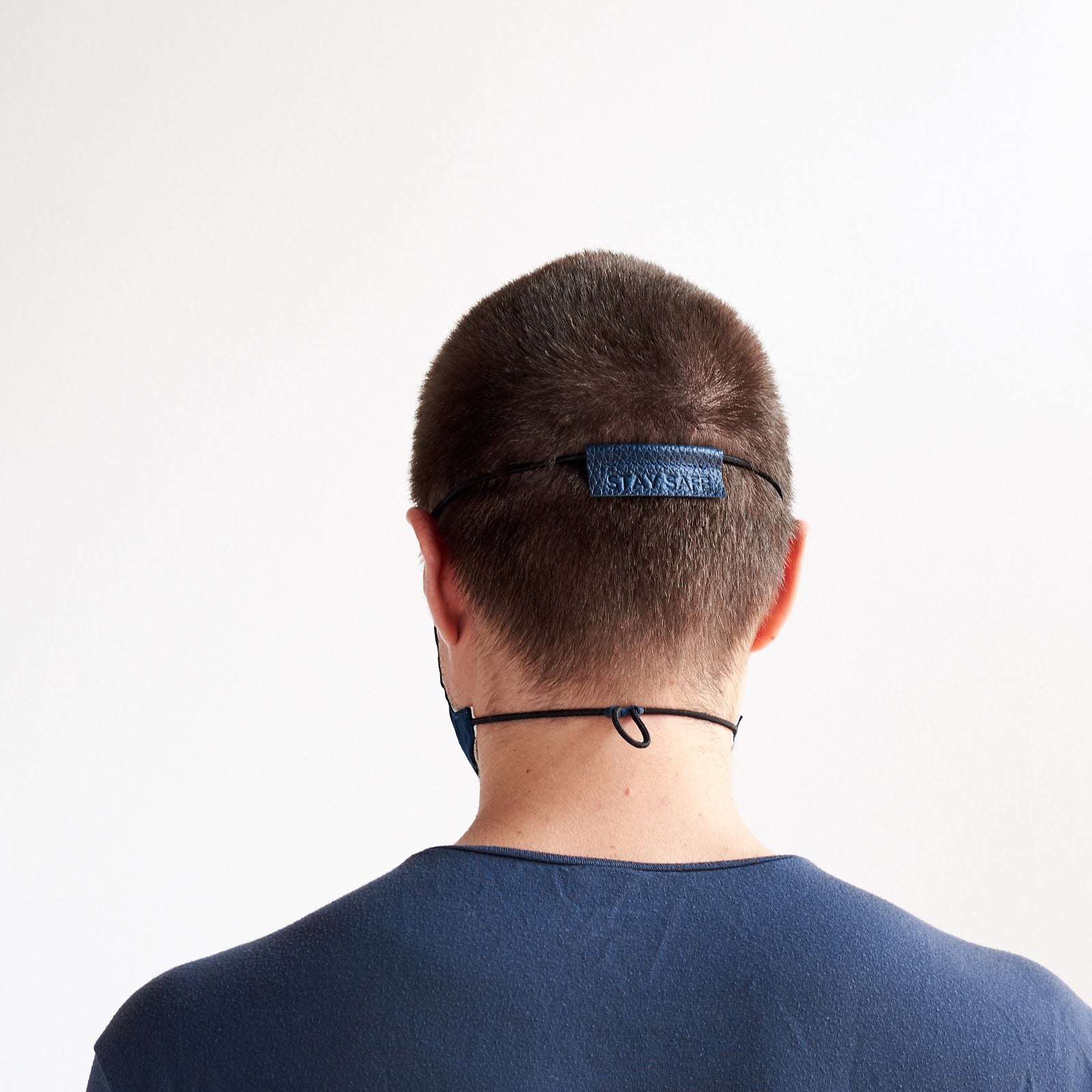 Front view. Blue linen Face Mask by Capra Leather