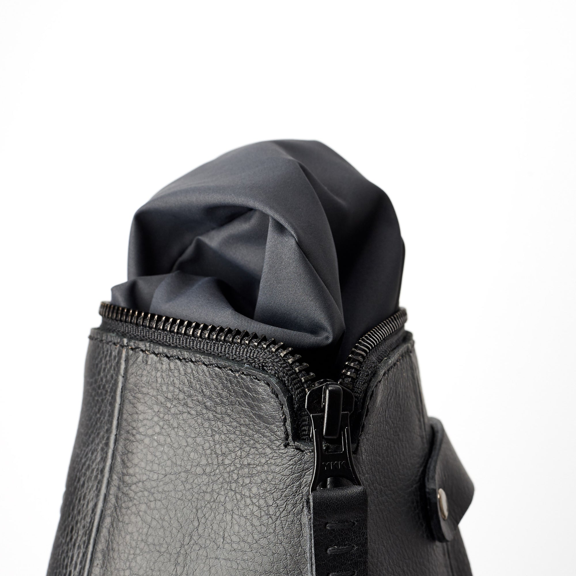 Detail, waterproof interior, hand stitched pull tabs. Black leather boxer toiletry bag. Mens leather dopp kit travel bag