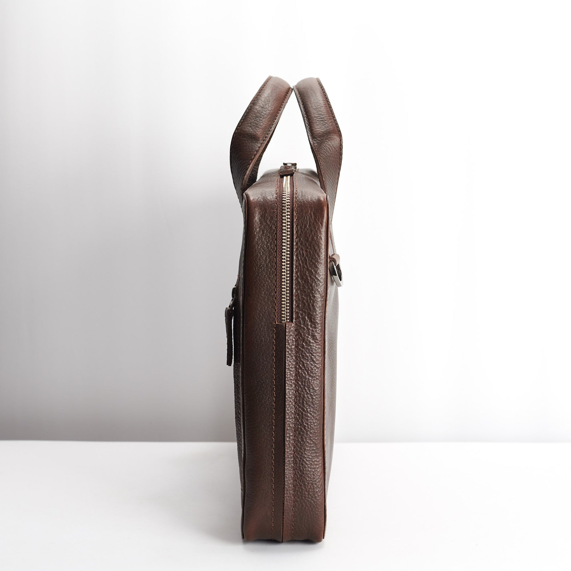 Slim profile. Dark brown leather briefcase for men. Office style mens workbag
