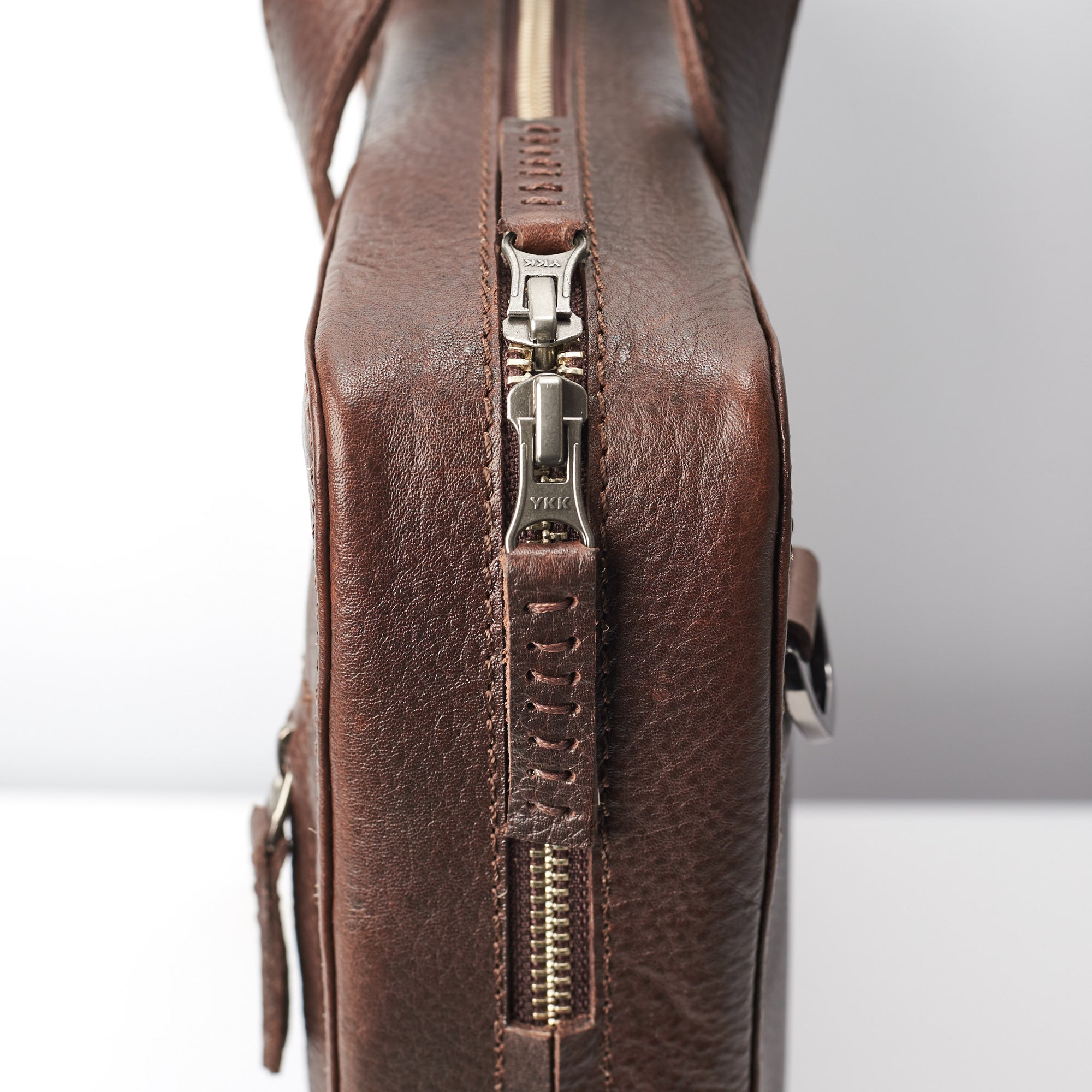 YKK zipper detail. Dark brown leather briefcase for mens gifts. Custom office bag