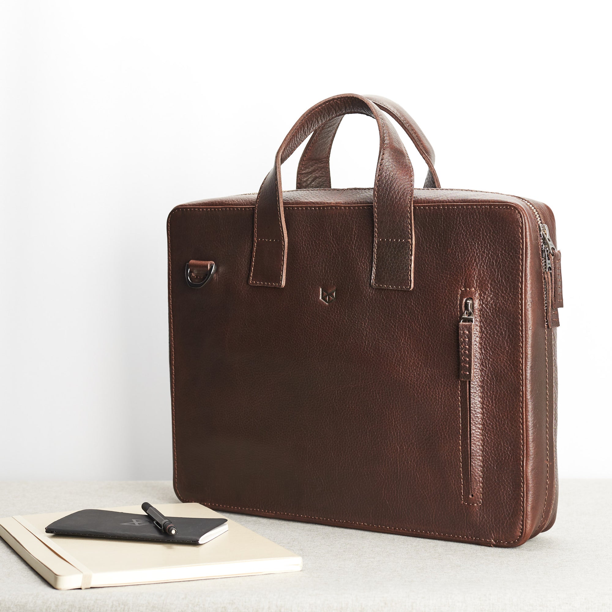 Style. Soft leather briefcase dark brown color