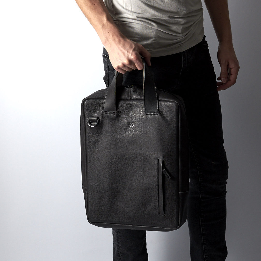 Style photo. Black formal bag for office. Mens leather briefcase 