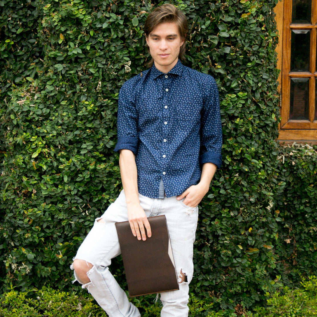 Style photo holding our dark brown leather macbook pro touch bar case