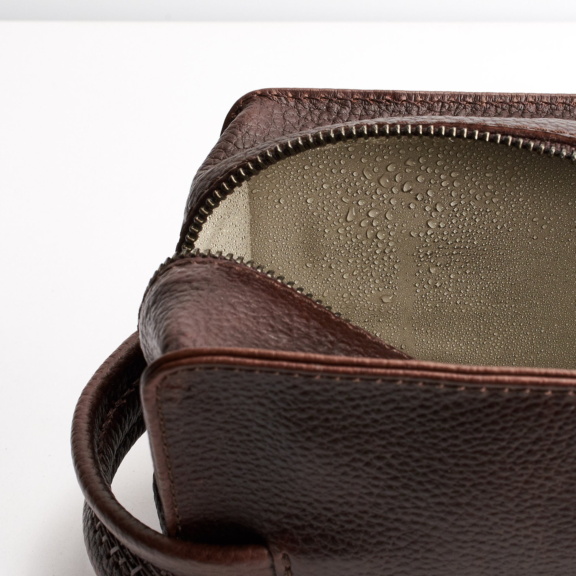 Waterproof interior. Dark Brown leather toiletry, shaving bag with hand stitched handle. Groomsmen gifts