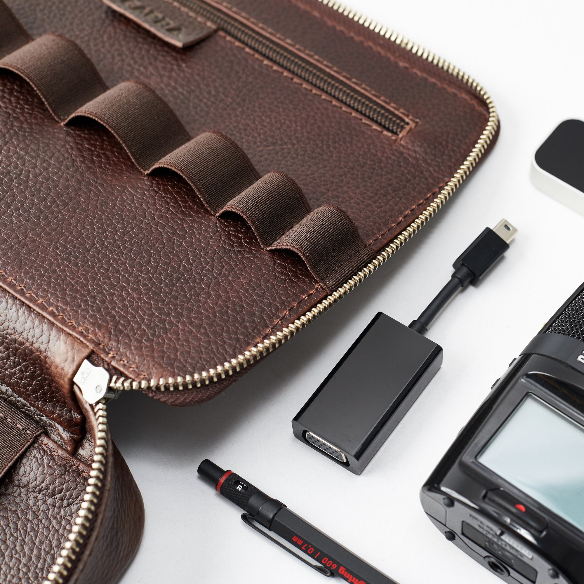 Internal organization. Dark Brown small leather edc gear pouch by Capra Leather. Fits iPad Pro 11