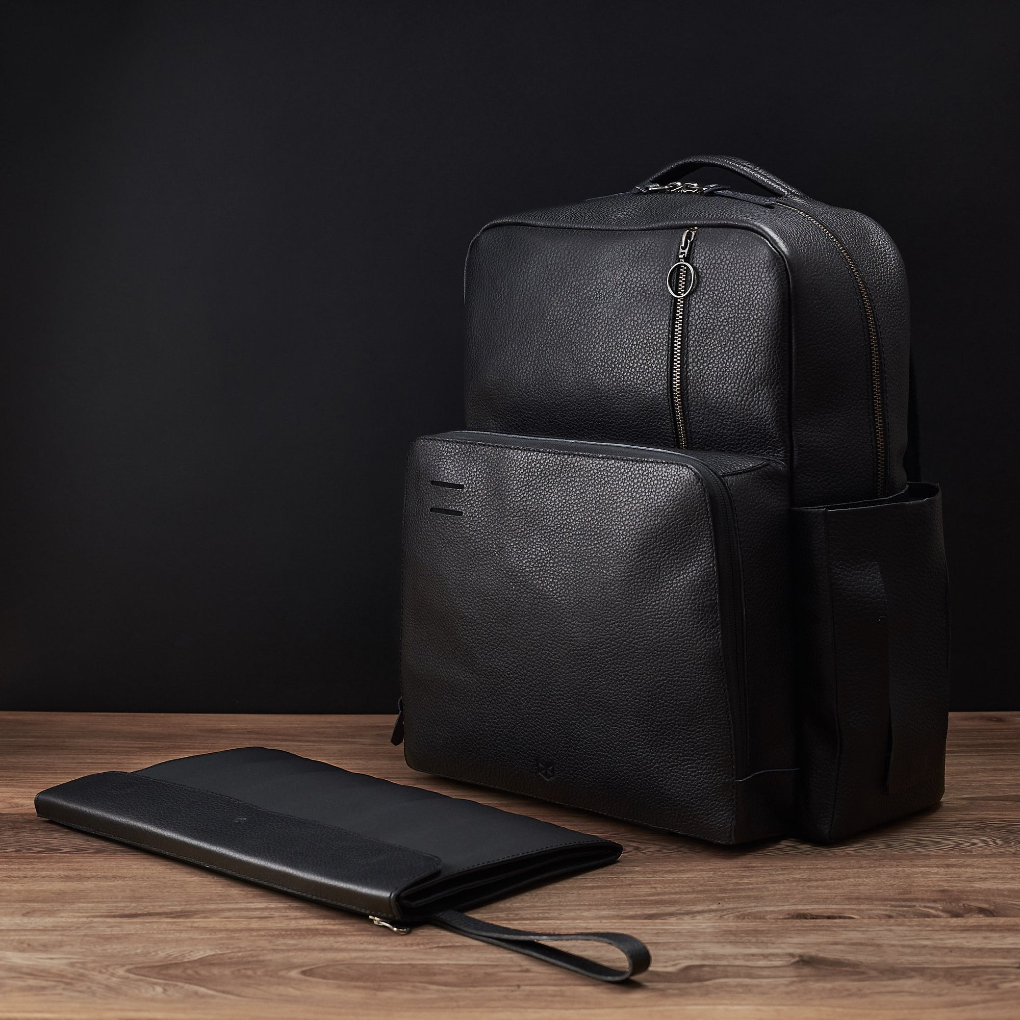 black leather diaper backpack by capra