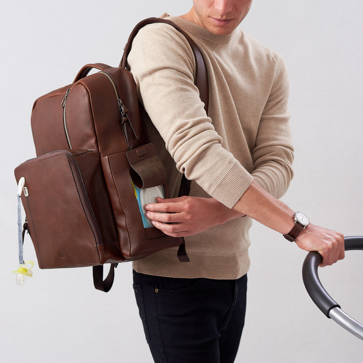 brown leather diaper bag by capra
