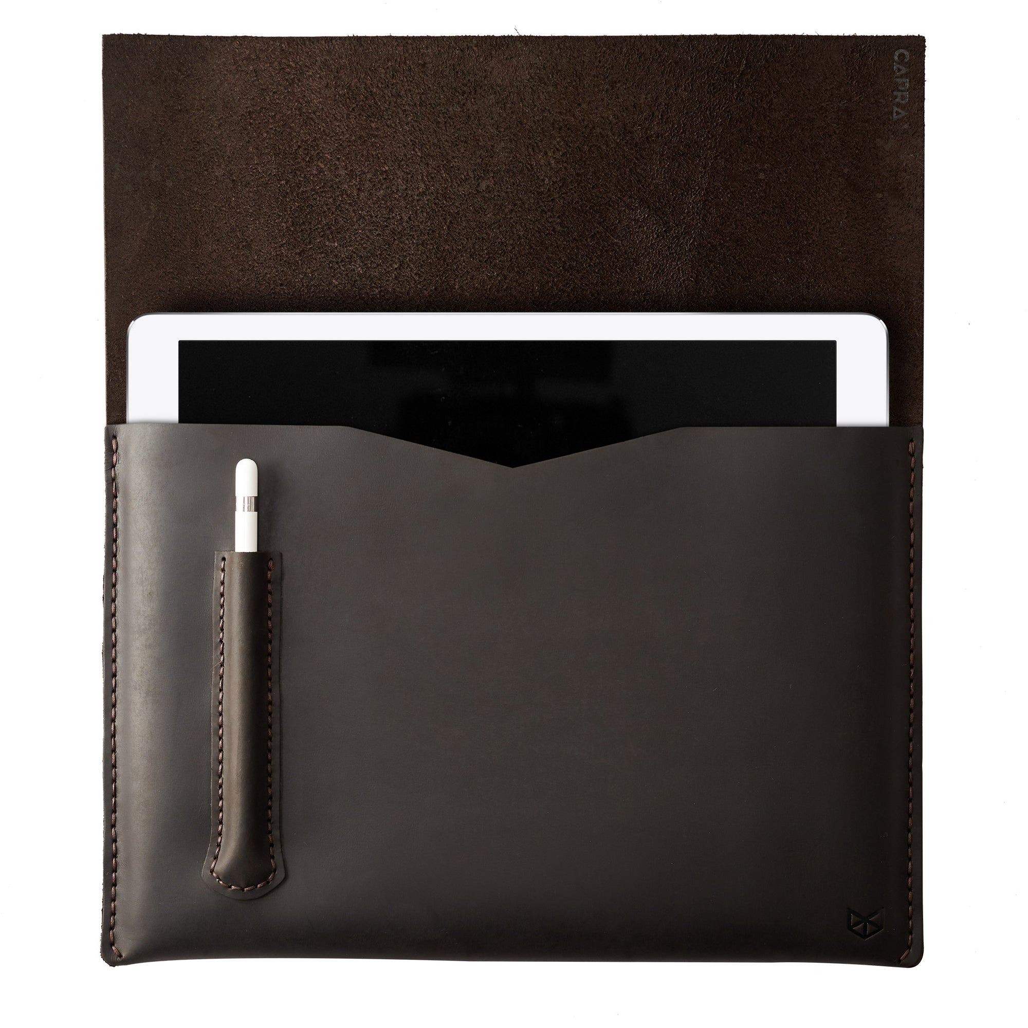 Style hold by model. Marron draftsman 2 case by Capra Leather. Microsoft Surface sleeve.