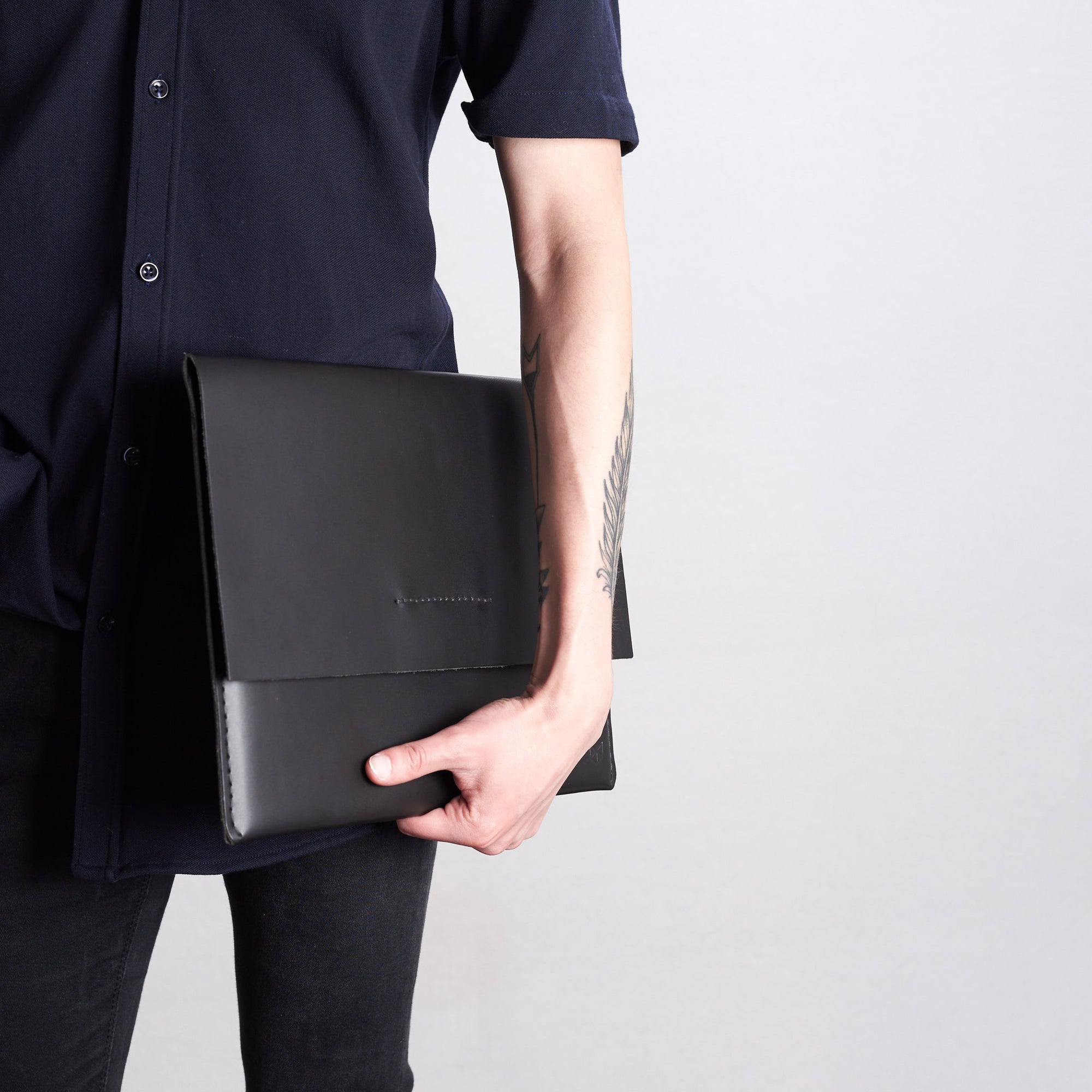 Style side model view of case. Black draftsman 1 case by Capra Leather. ZenBook sleeve.